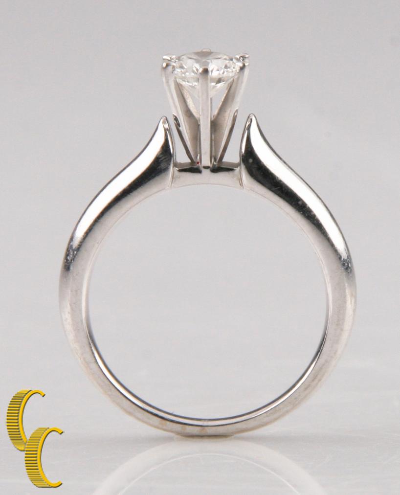 Gorgeous 14k White Gold Diamond Engagement Ring
Features Round Brilliant Prong-Set Solitaire Diamond
Size: 5.5
Total Mass = 4.3 grams
Width of Band = 1.5 grams
Includes EGL Certificate Which Reads:
Report: US 45215301D
Shape/Cut: ROUND
