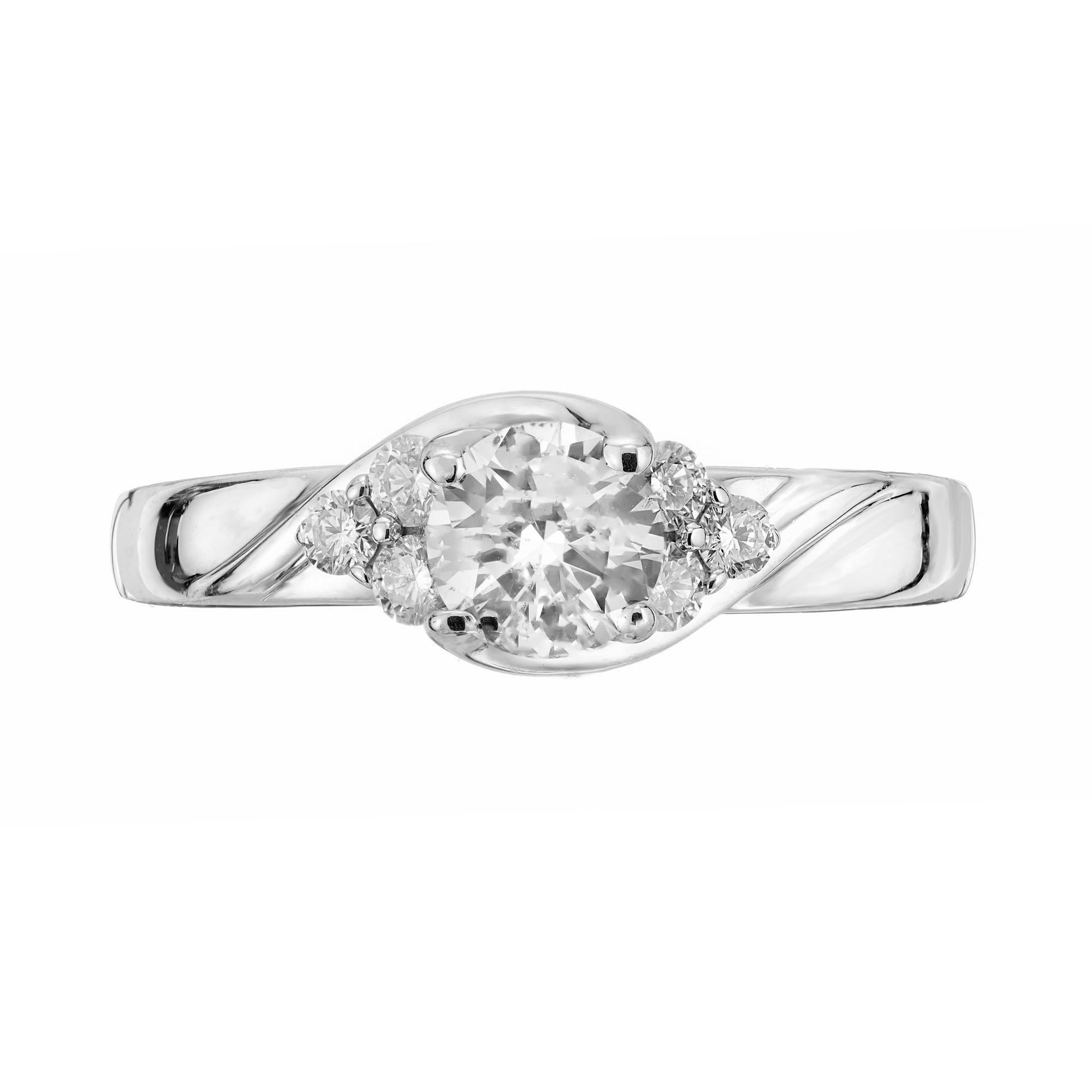 Swirl design white gold Diamond engagement ring with an EGL certified round center Diamond in a 14k white gold setting. Accented with 3 full cut Diamonds on each side. 

1 round Diamond, approx. total weight .76cts, F – G, I1, EGL certificate #