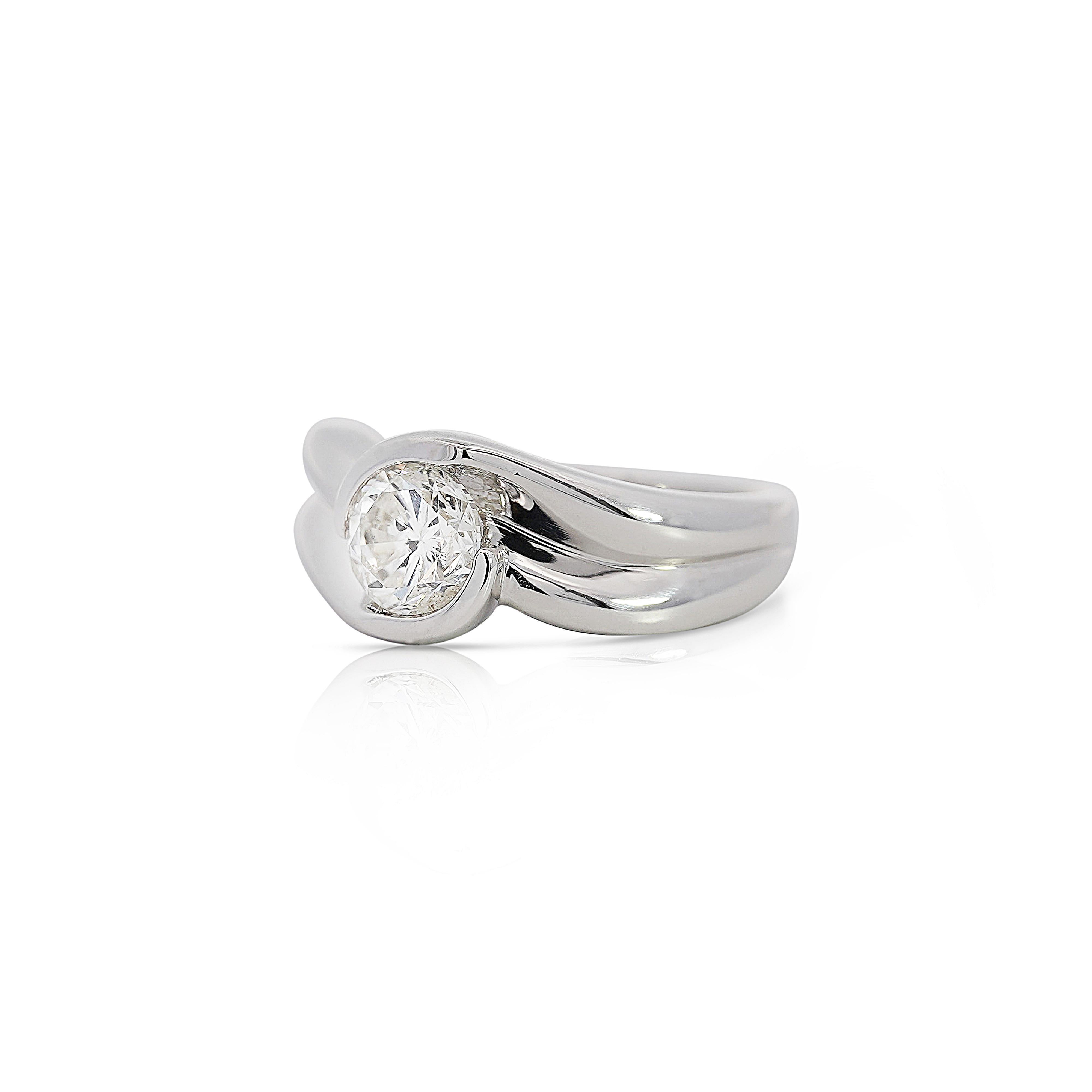 EGL Certified 1.01 Carat Round Cut Brilliant F-G color/SI3 clarity Diamond Platinum Bypass 850 Ring Size 6.5.

Details:
Item Type: Bypass Ring
Metal: Platinum 850
Size: 6.5 (adjustable)
Weight: 8.81 Grams
 
Center Stone Details:
Type: Diamond
Carat: