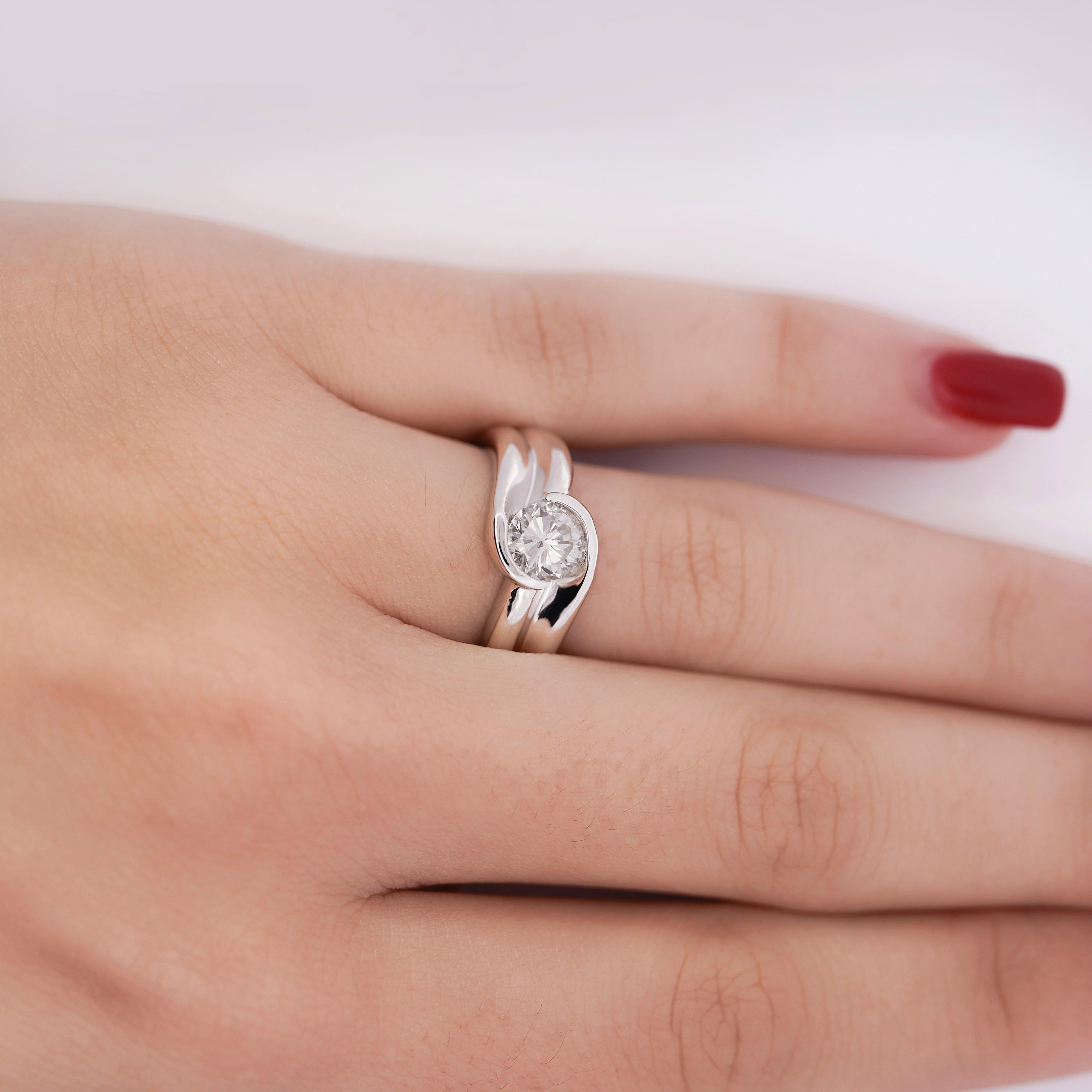 Brilliant Cut EGL Certified 1.01 Carat Round F-G/SI3 Diamond Platinum Bypass Engagement Ring For Sale