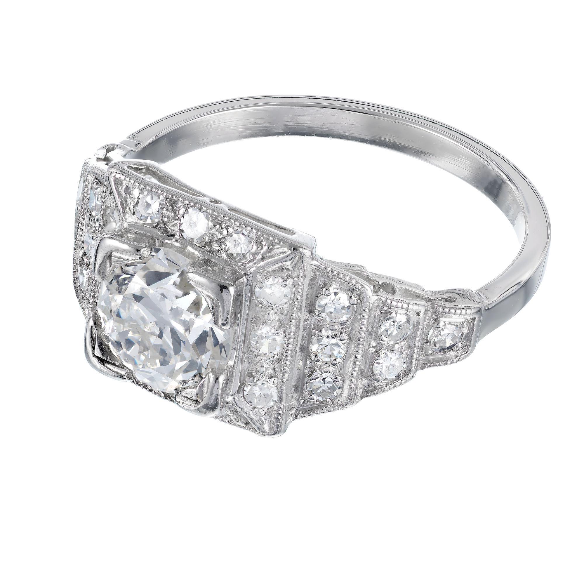Original Platinum step design Art Deco diamond engagement ring. Circa 1920's. EGL certified center stone.

1 old European cut diamond 1.11ct, F-G, VS2. Depth: 62.4% Table: 55%.Strong blue florescence EGL # US58492701D
24 round transitional single