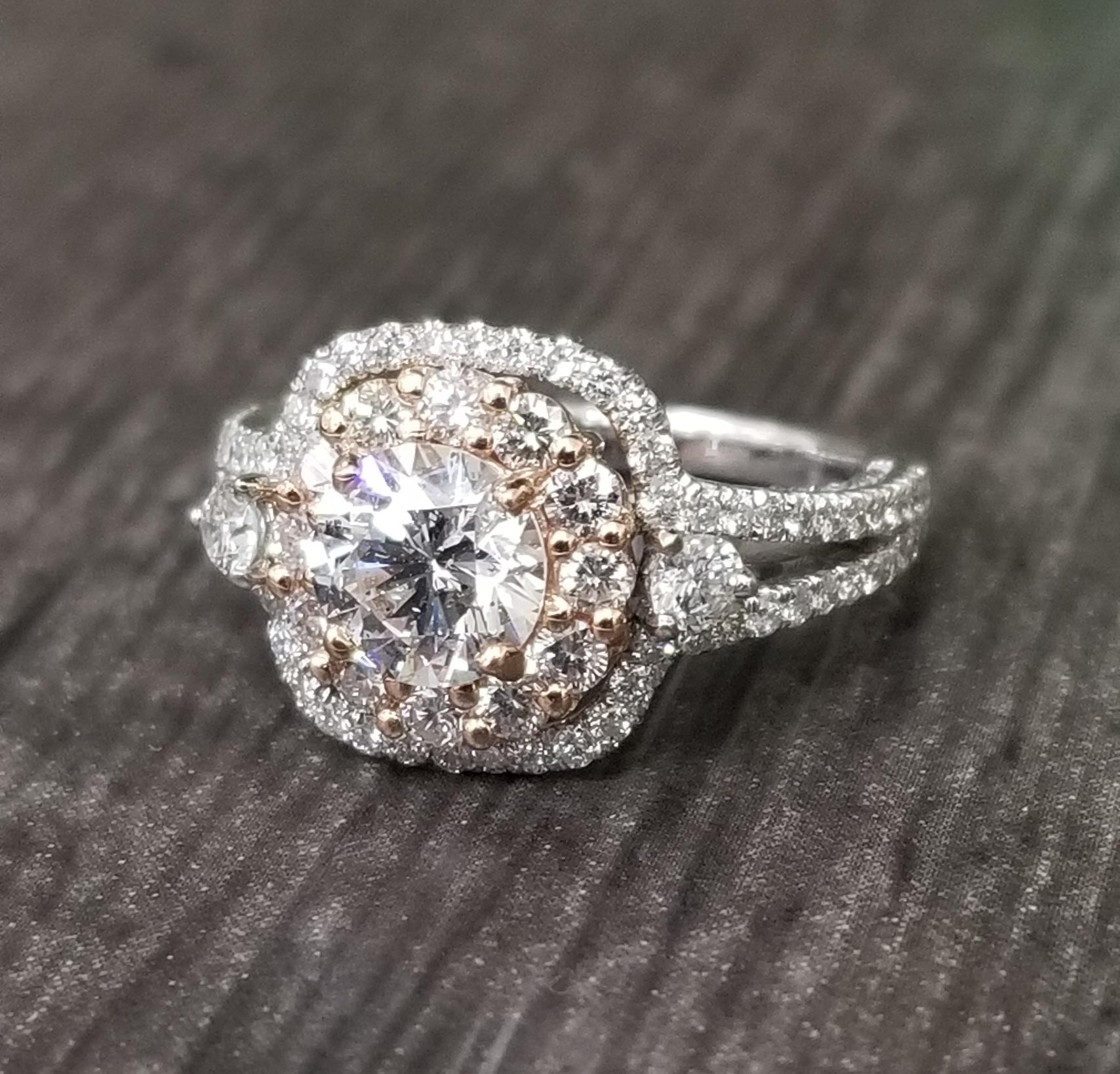 14k white and rose gold ladies diamond ring containing 1 brilliant cut diamond; color 