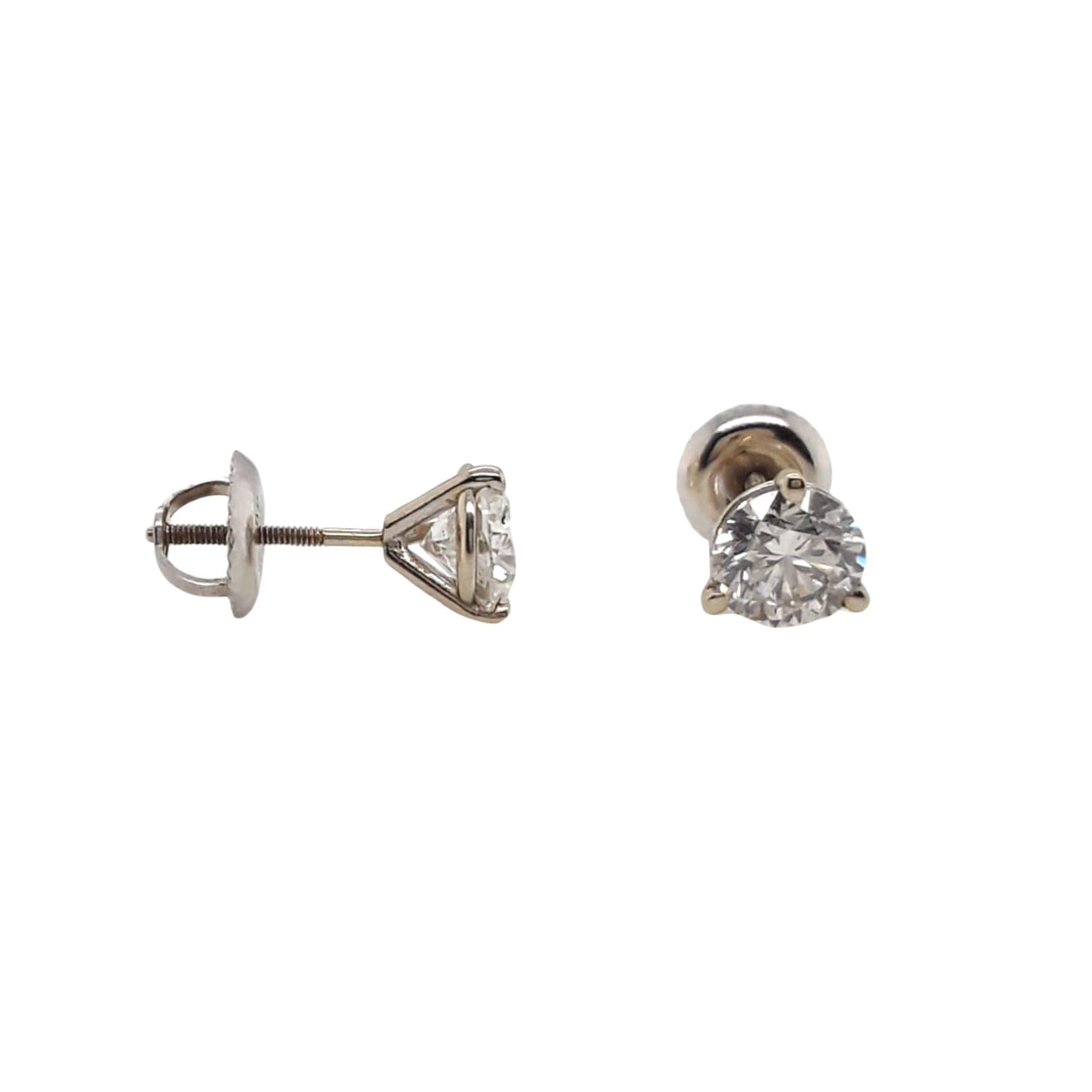 EGL Certified Diamond Stud Earrings made with natural brilliant cut diamonds. Total Weight: 1.42 carats, Stone Diameter: 5.54 x 5.53, Color: G-H, Clarity: SI3-I1. Set on a 4 prong mounting in 18 karat white gold, screw back setting. 