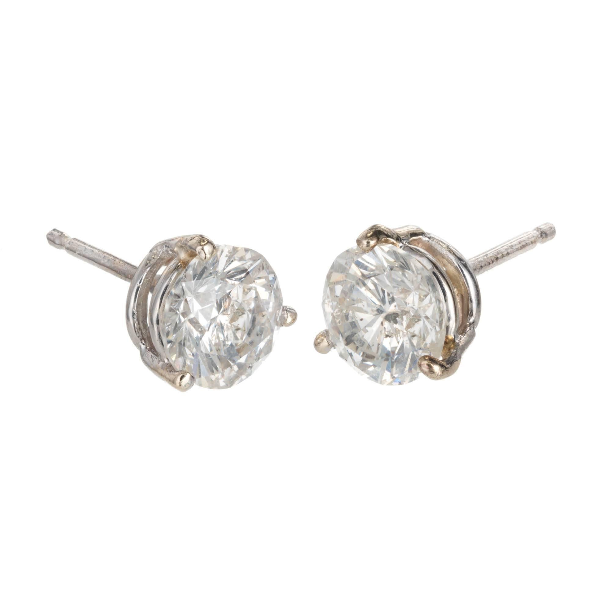 1.50ct Diamond Stud Earrings in 14k White Gold 3 Prong Baskets.

1 round brilliant cut diamond, approx. total weight .75cts, H-I, SI3, 5.76 x 5.74 x 4.0mm, EGL certificate#US66844301J
1 round brilliant cut diamond, approx. total weight .75cts, H-I,