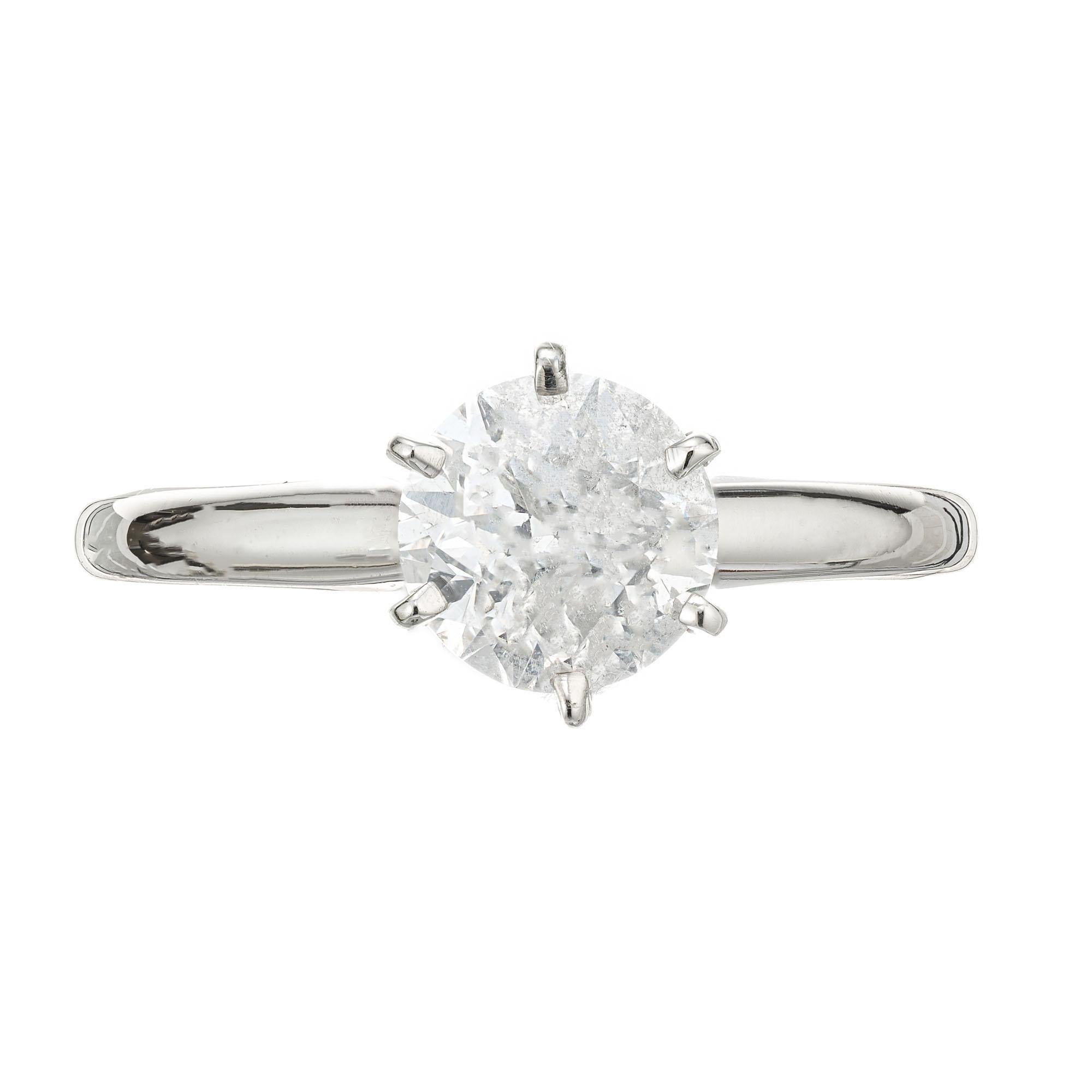Diamond solitaire engagement ring. EGL certified round brilliant cut center stone in a six prong 14k white gold setting. 

1 EGL certified (#US66679301D
) round diamond approx. total weight 1.51cts, F-G, I1. 2.8 grams.  68.9% depth and 55%