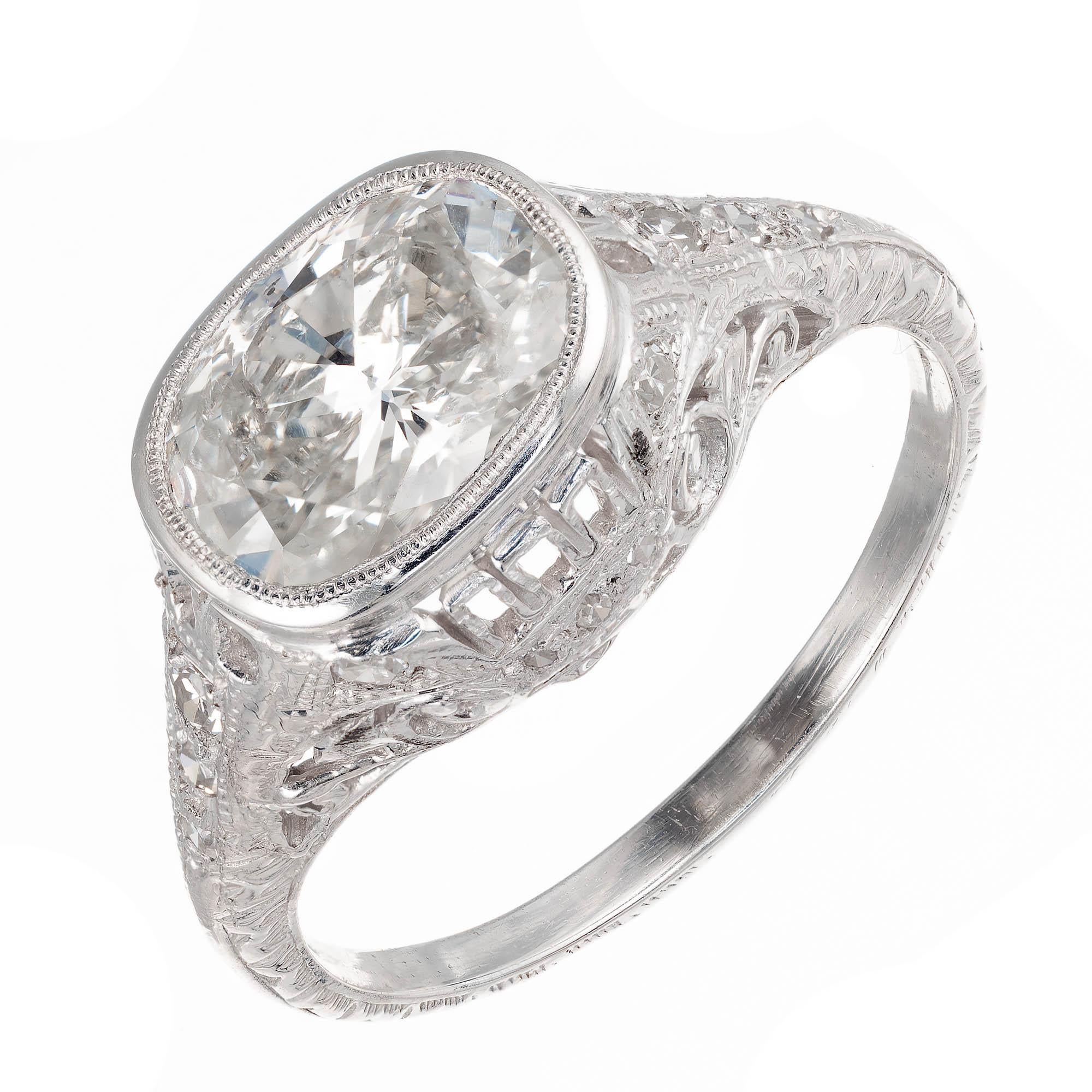 1930’s Diamond platinum filigree engagement ring. Original cushion cut 1.50 carat diamond in a platinum setting with round accent diamonds.

1 cushion oval brilliant cut I-J I diamond, Approximate 1.52 carat. EGL certificate # US4001163291D
16