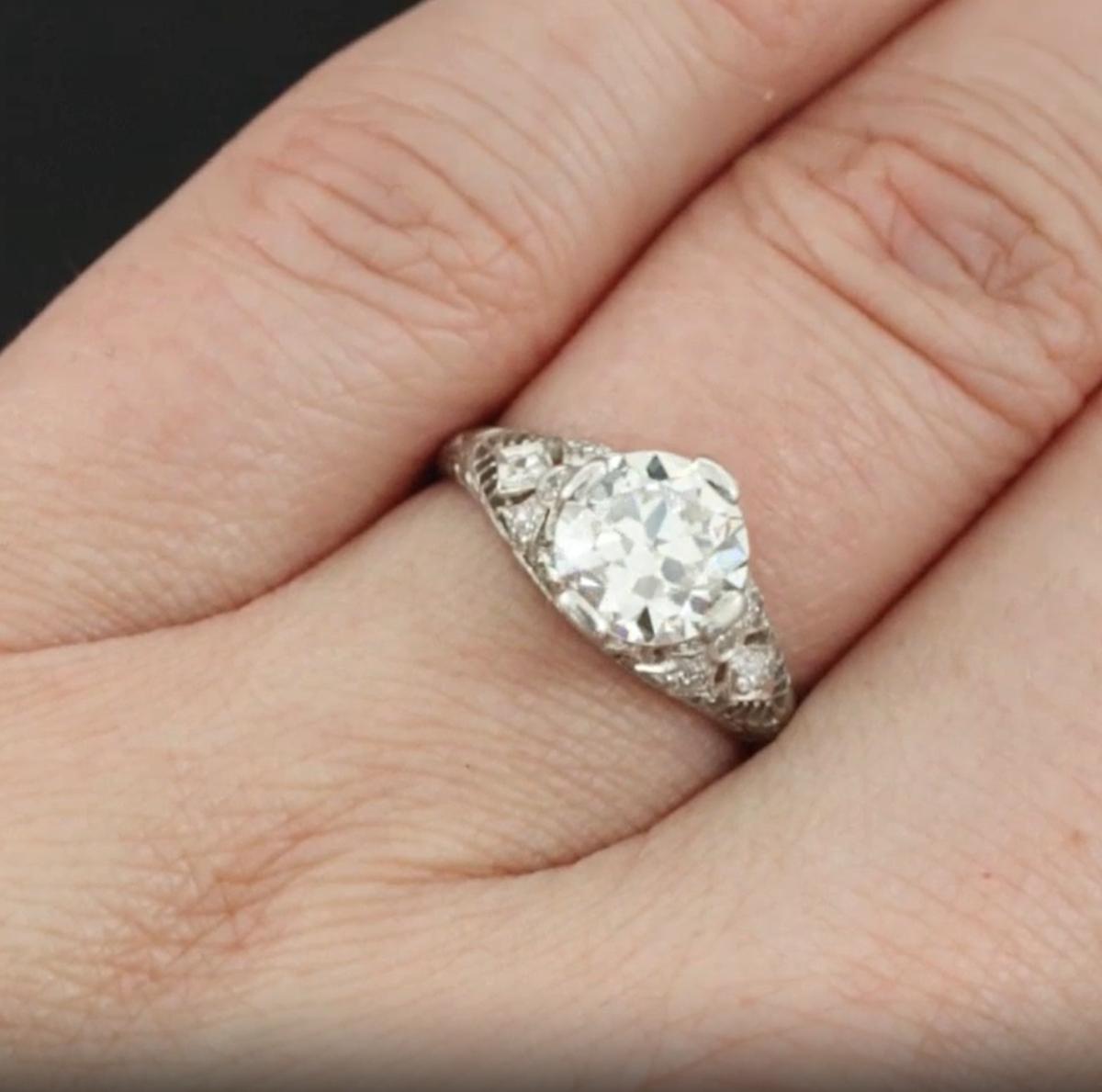 Art Deco EGL Certified 1.56 Carat Old Transitional Cut Diamond Engagement Platinum Ring For Sale