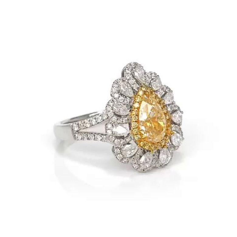 Contemporary EGL Certified 1.58 Carat Pear Shape Vivid Fancy Yellow Diamond Engagement Ring For Sale