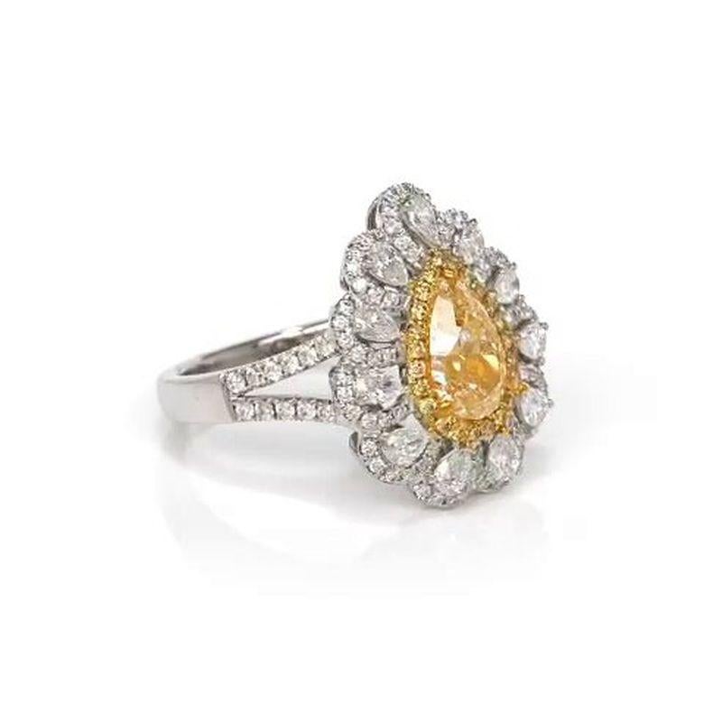 Women's or Men's EGL Certified 1.58 Carat Pear Shape Vivid Fancy Yellow Diamond Engagement Ring For Sale