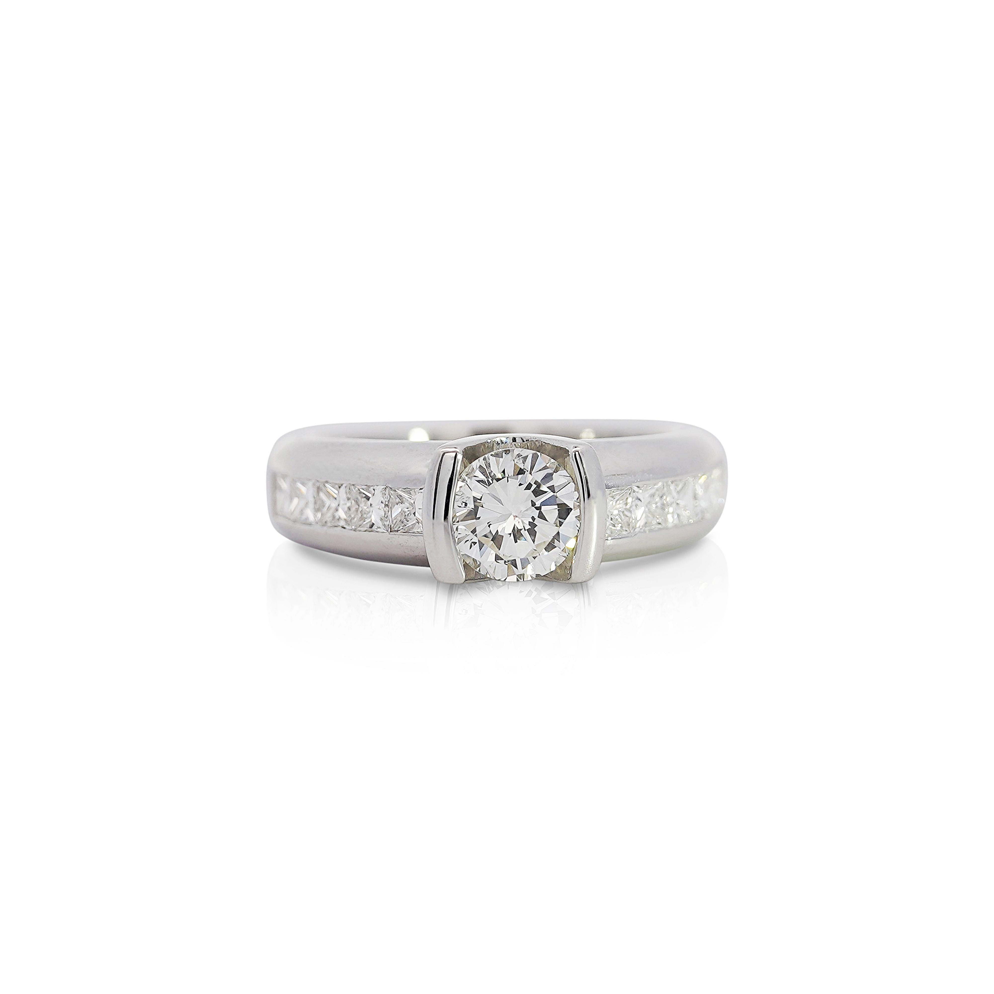 EGL Certified 1.65 Carat Round & Princess Cut G-H Color SI2 Clarity Natural Diamond Platinum Channel and Half Bezel Set Engagement Ring.

Details:
Item Type: Channel Set Engagement Ring
Metal: Platinum 900
Size: 6.5 (adjustable)
Weight: 9.50