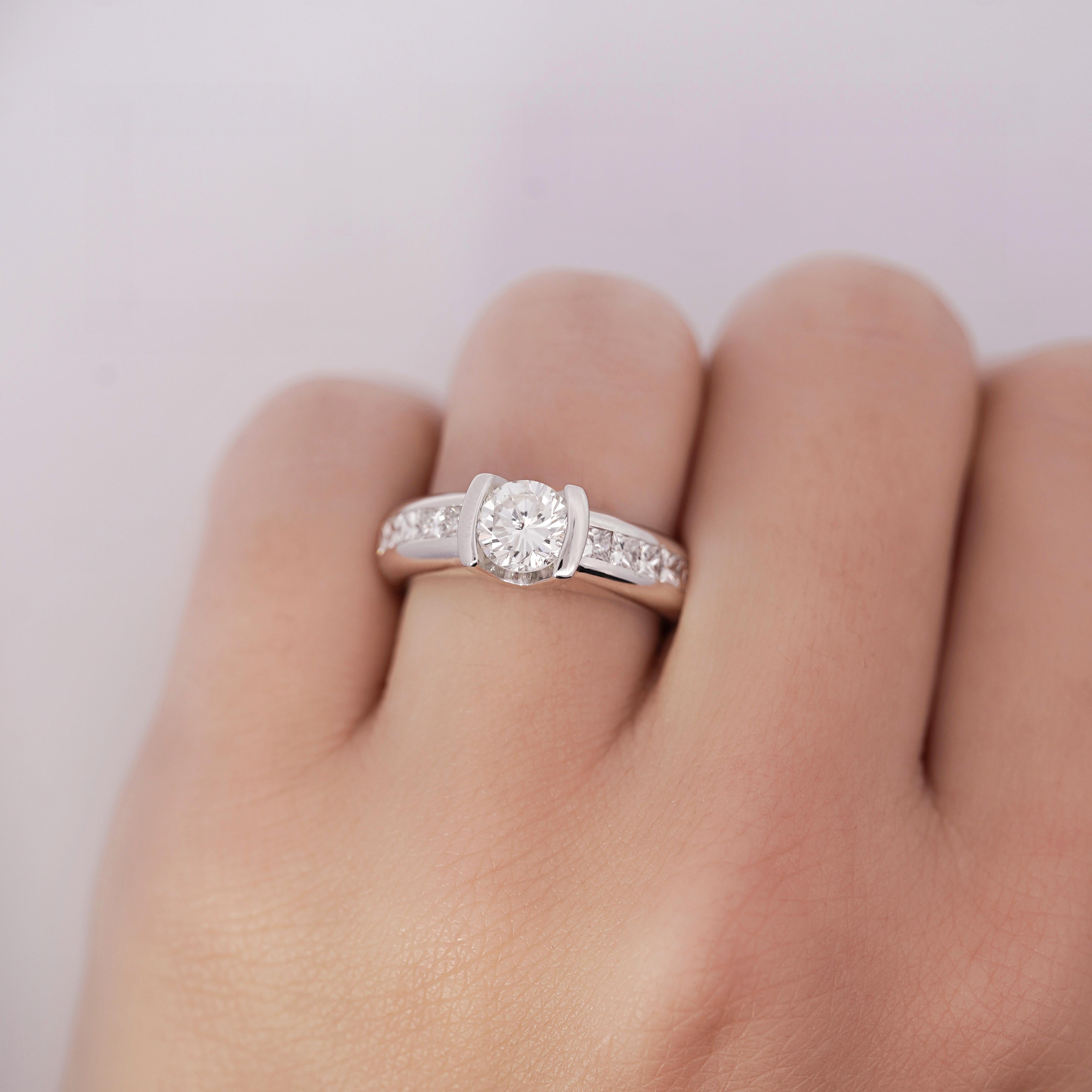 Contemporary EGL Certified 1.65 Carat Round & Princess Diamond Platinum Channel Set Ring For Sale