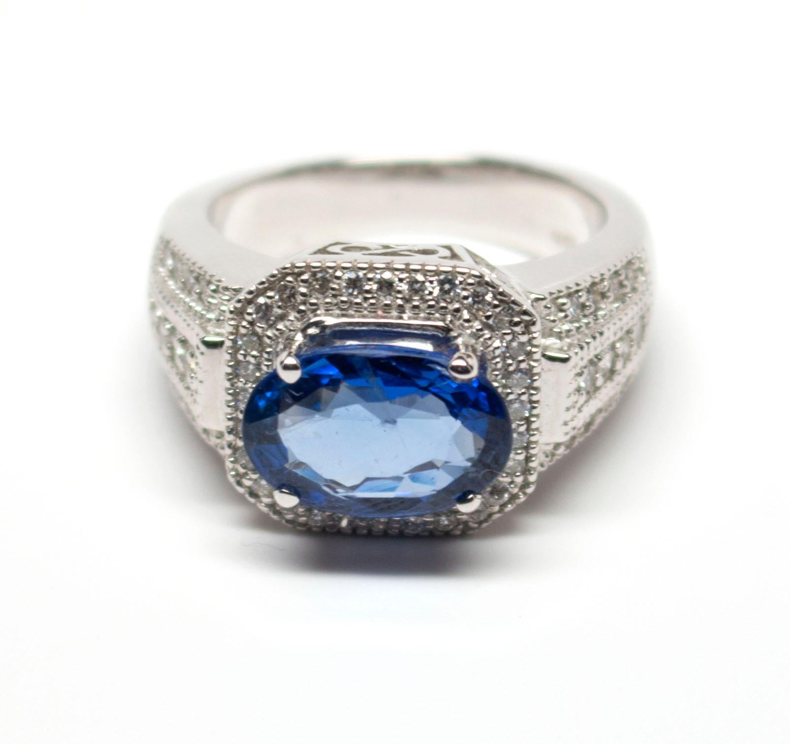 Women's Egl Certified 18 Karat White Gold 3.70 Carat Sapphire 0.76 Diamond Ring For Sale