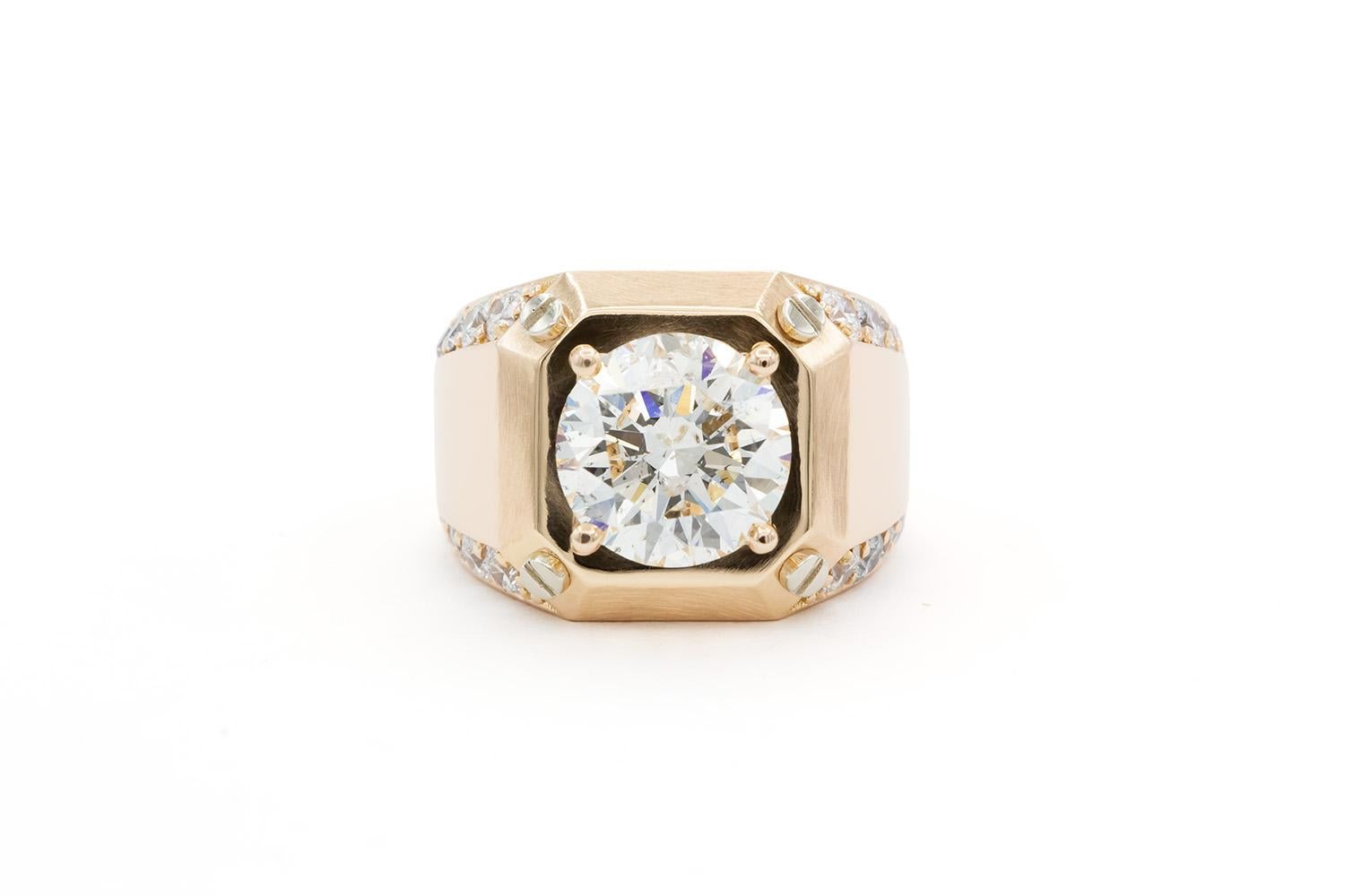 We are pleased to offer this EGL Certified 18k Rose Gold Hearts & Arrows Diamond Solitaire Signet Style Mens Ring. It features an EGL certified 5.30ct H/SI2 round brilliant cut diamond accented by an estimated 1.50ctw round brilliant cut diamonds