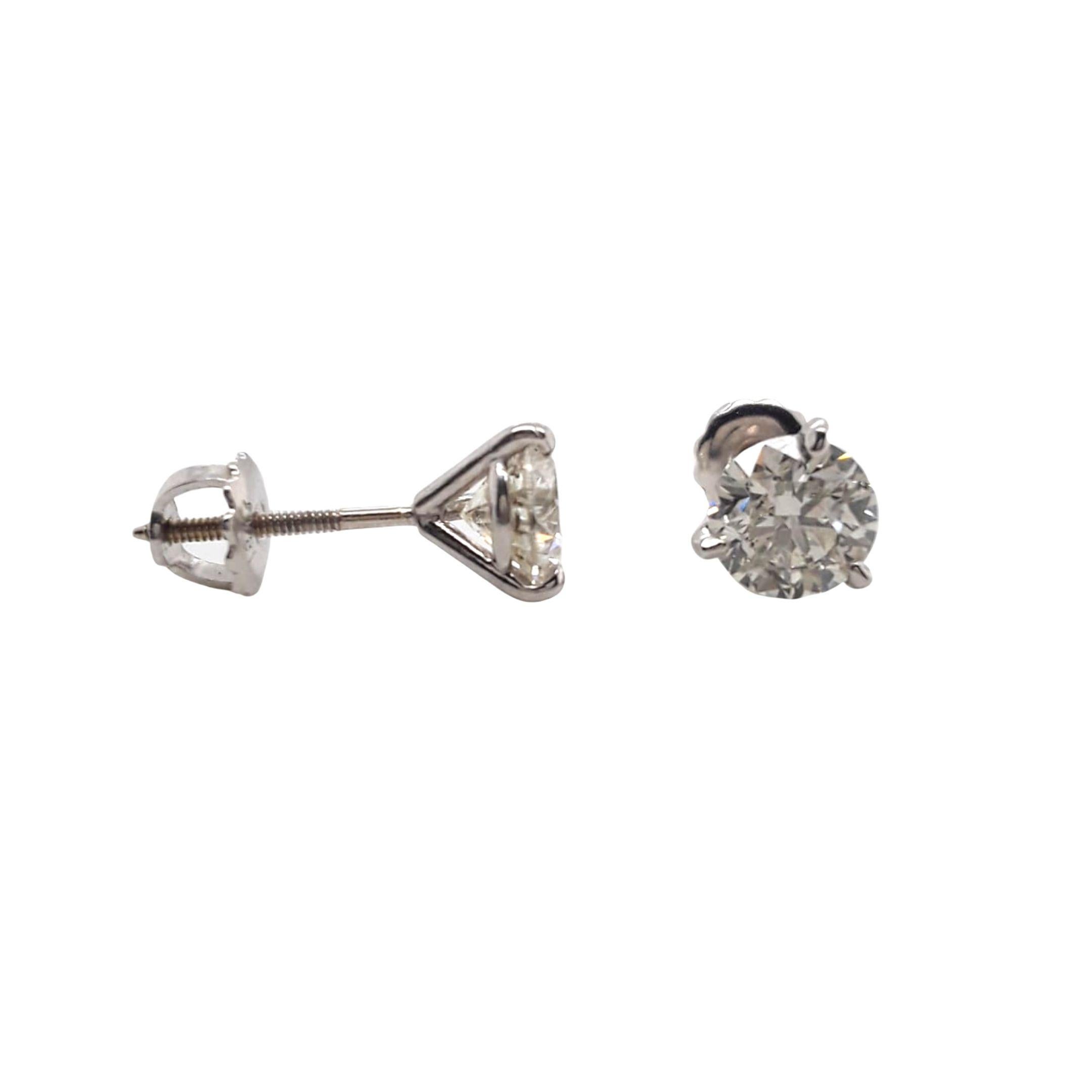 EGL Certified Diamond Stud Earrings made with natural brilliant cut diamonds. Total Weight: 2.04 carats, Stone Diameter: 6.36 x 6.27, Color: G-H, Clarity: SI3. Set on a 3 prong mounting in 18 karat white gold, screw back setting. 