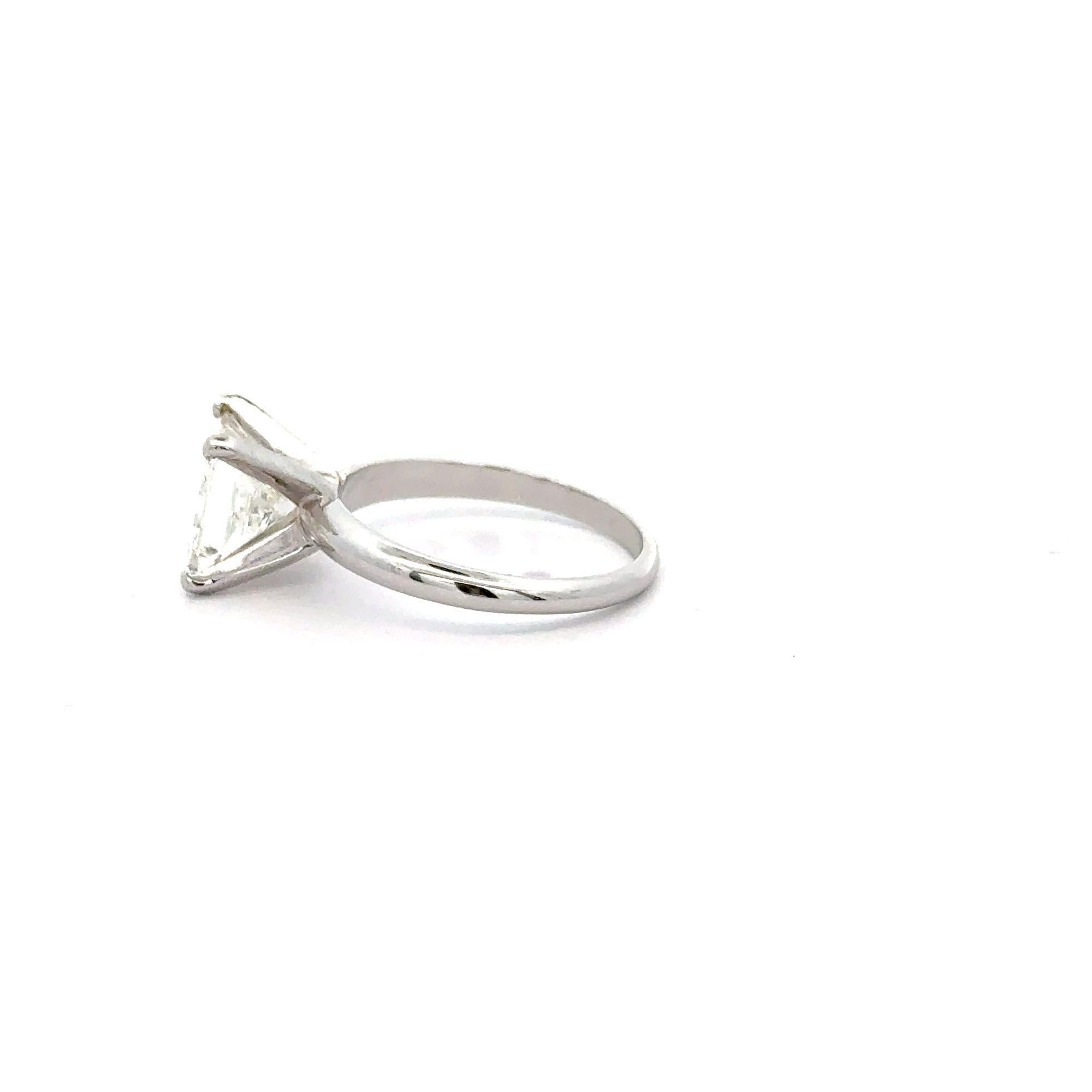 EGL Certified 2.15 Carat Princess Cut Diamond in 14K White Gold Engagement Ring.

Details:
Item Type: Engagement Ring
Metal: 14K White Gold
Size: 6.5 (resizable)
Weight: Approx. 4.5 grams

Center Stone Details:
Type: Natural Diamond
Carat Weight: