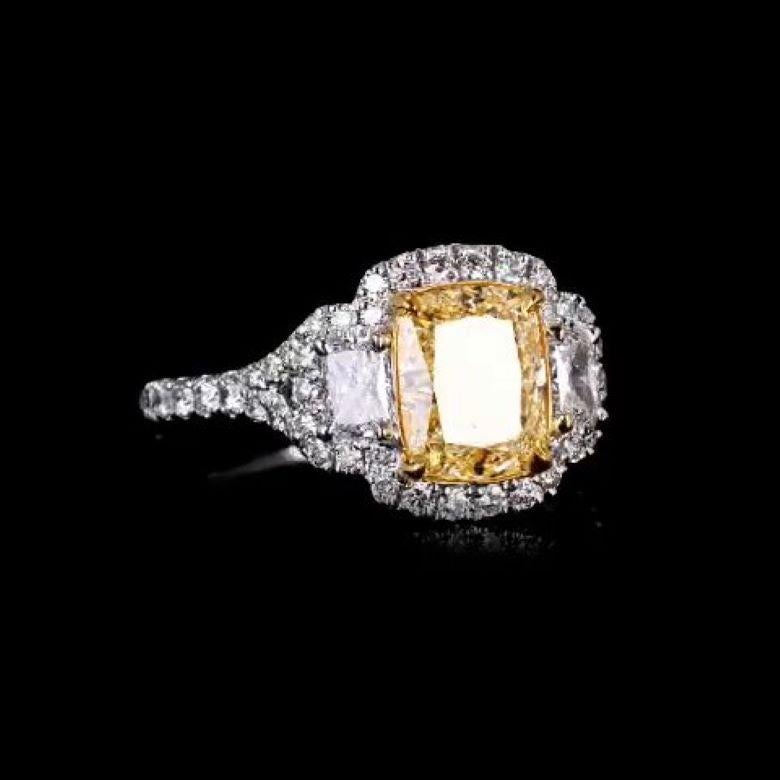 Women's EGL Certified 2.18 Carat Fancy Intense Yellow VS1 Cushion Halo Diamond Ring For Sale