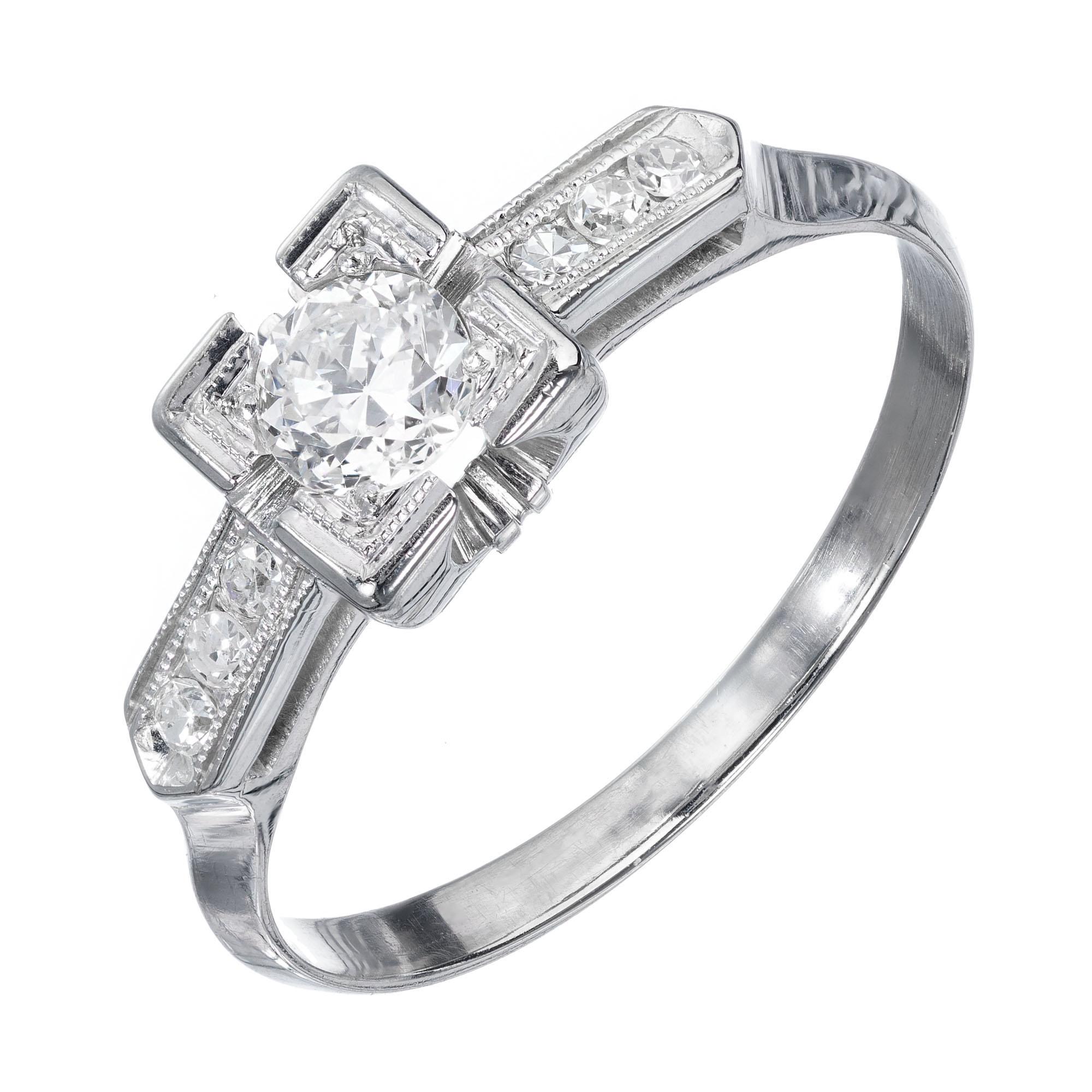 Art Deco diamond engagement ring. EGL certified center diamond set in a 18k white gold setting, with six single cut accent diamonds. Circa 1940.

1 0.25ct old European cut F to G color, SI1 clarity, Depth: 62.9% Table: 60%, Ideal cut. EGL