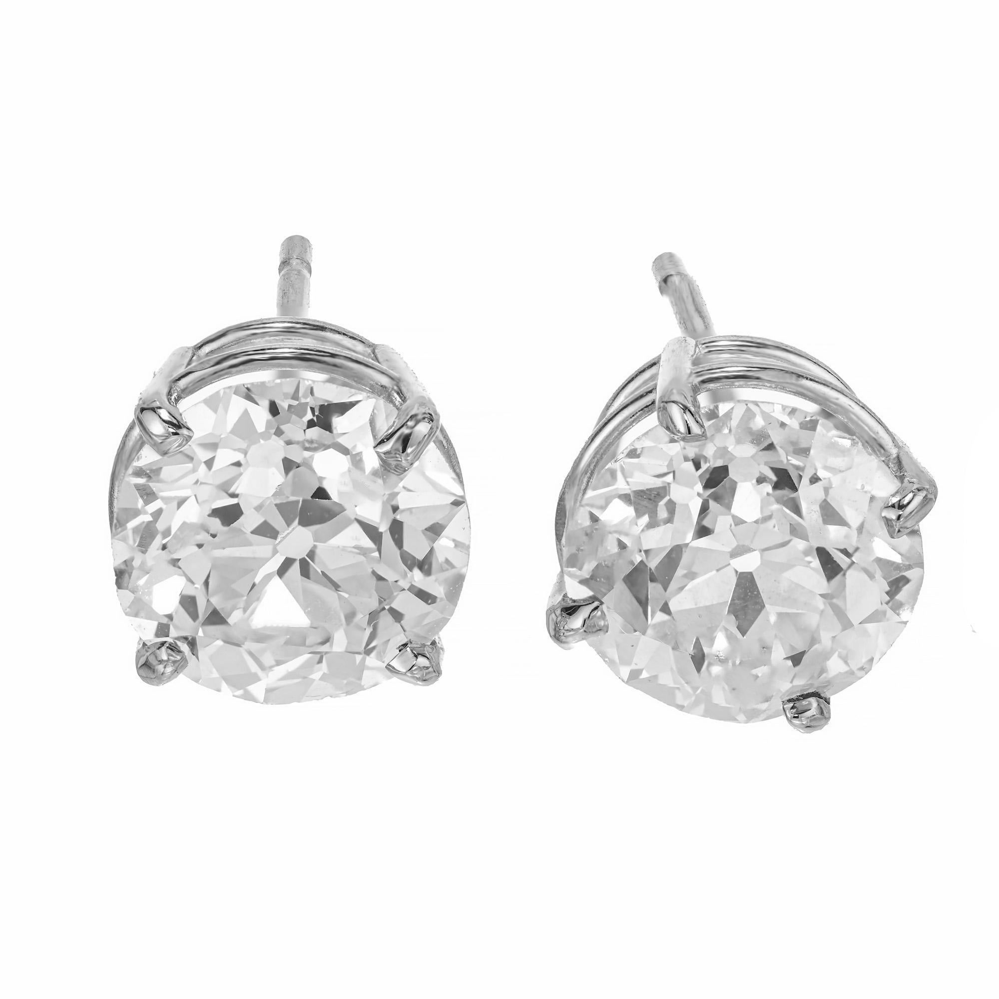 1920's EGL Certified diamond stud earrings. 2 Old European cut diamonds one weighing approximately 1.76cts with the other at 1.75cts. Set in 14k white gold, 4 prong simple baskets settings. These diamonds are well matched with equal brilliance and