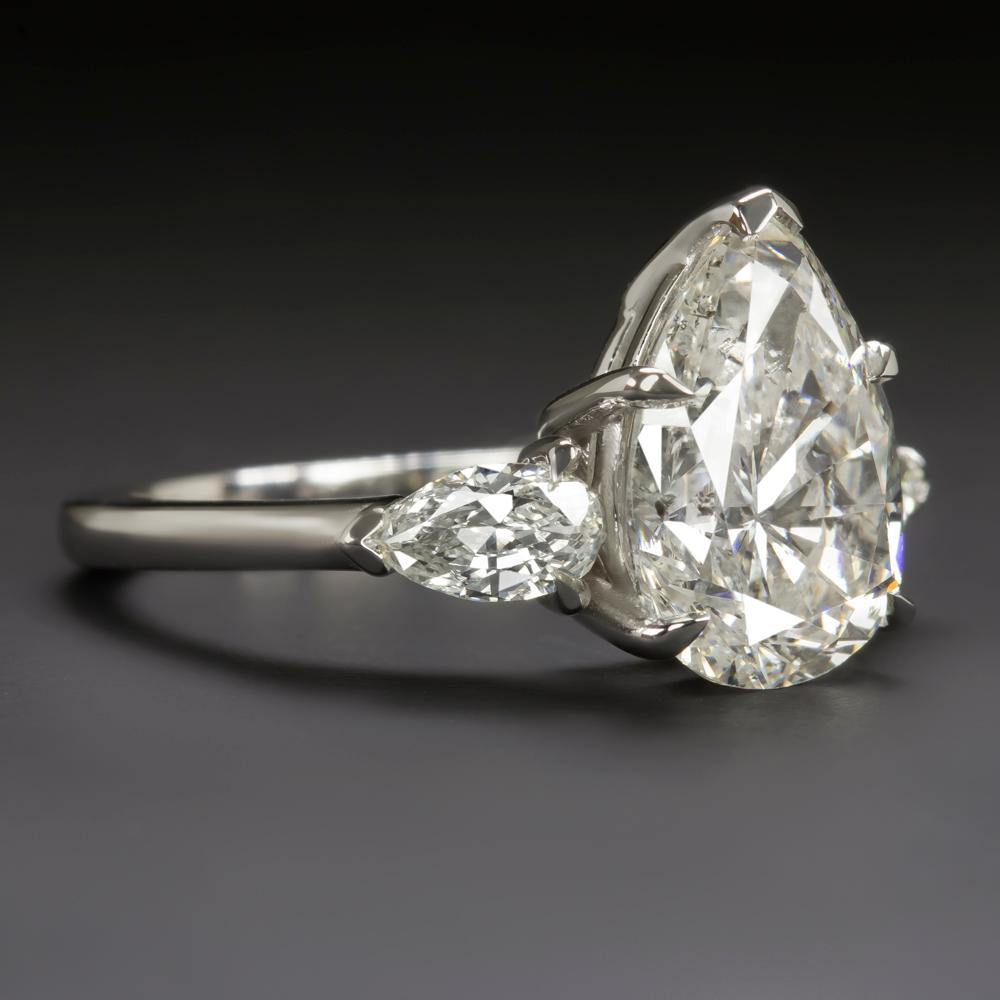 GIA 3 Karat Birnenschliff Diamantring mit drei Steinen (Moderne)