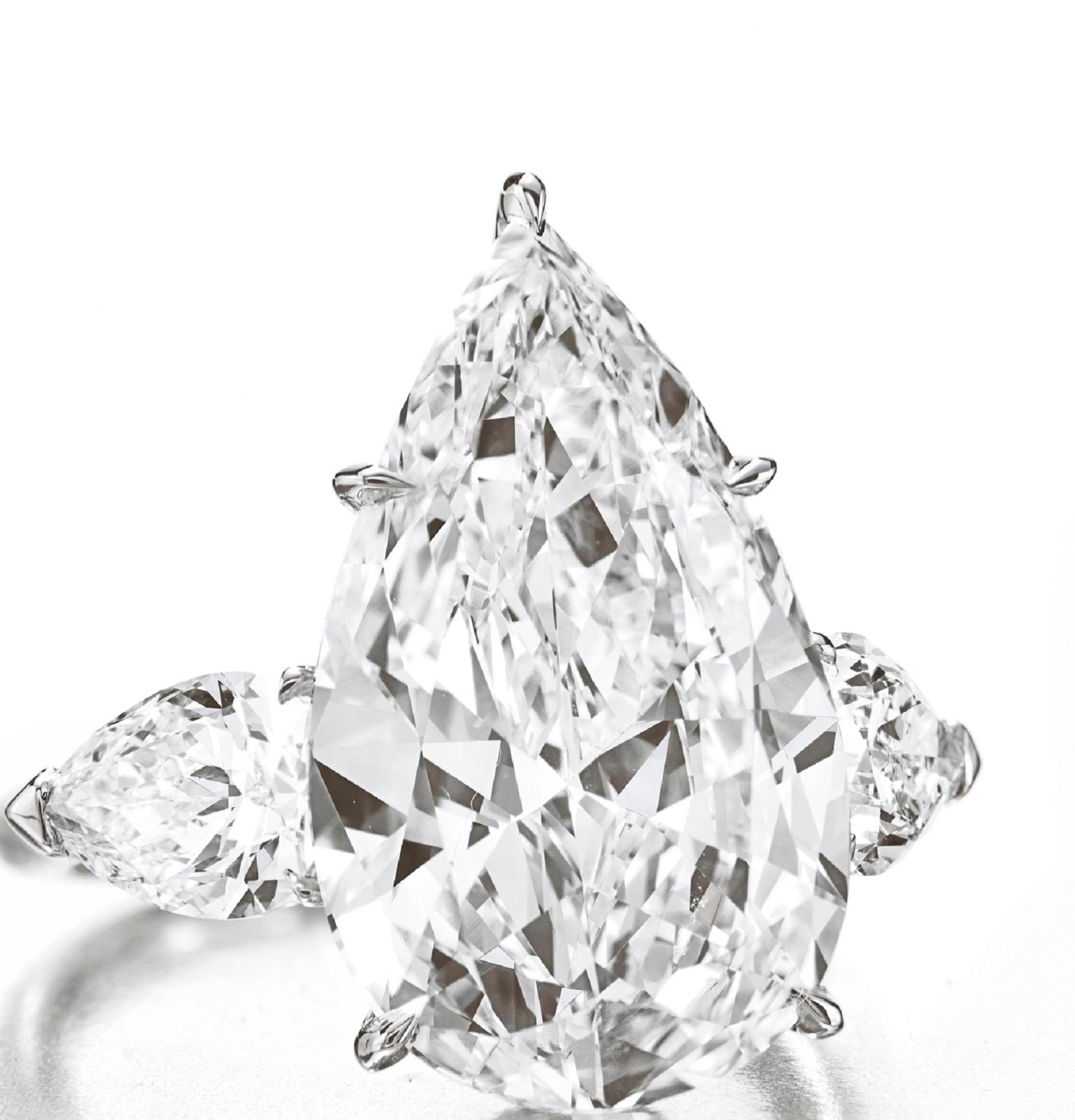 Modern GIA 3 Carat Pear Cut Three Stone Diamond Ring