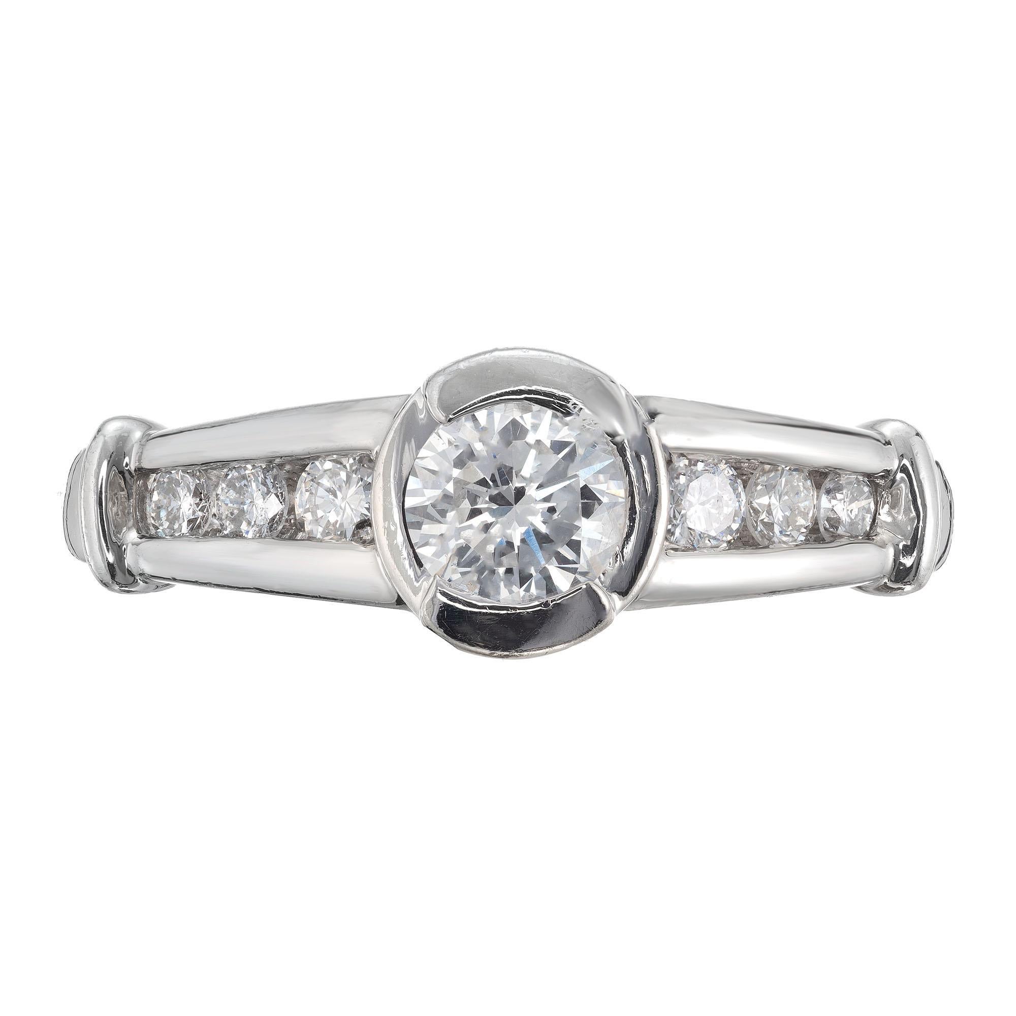 Designer FD diamond engagement ring. EGL certified round center semi bezel diamond with 6 full cut diamonds in a platinum setting. 

One diamond, approx. total weight .40ct, F, SI2, 4.70 x 4.50 x 2.90mm. EGL certificate #US64571901D
6 full cut