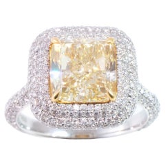 EGL Certified 4.25-carat Cushion-cut Fancy Light Yellow Diamond Platinum Ring