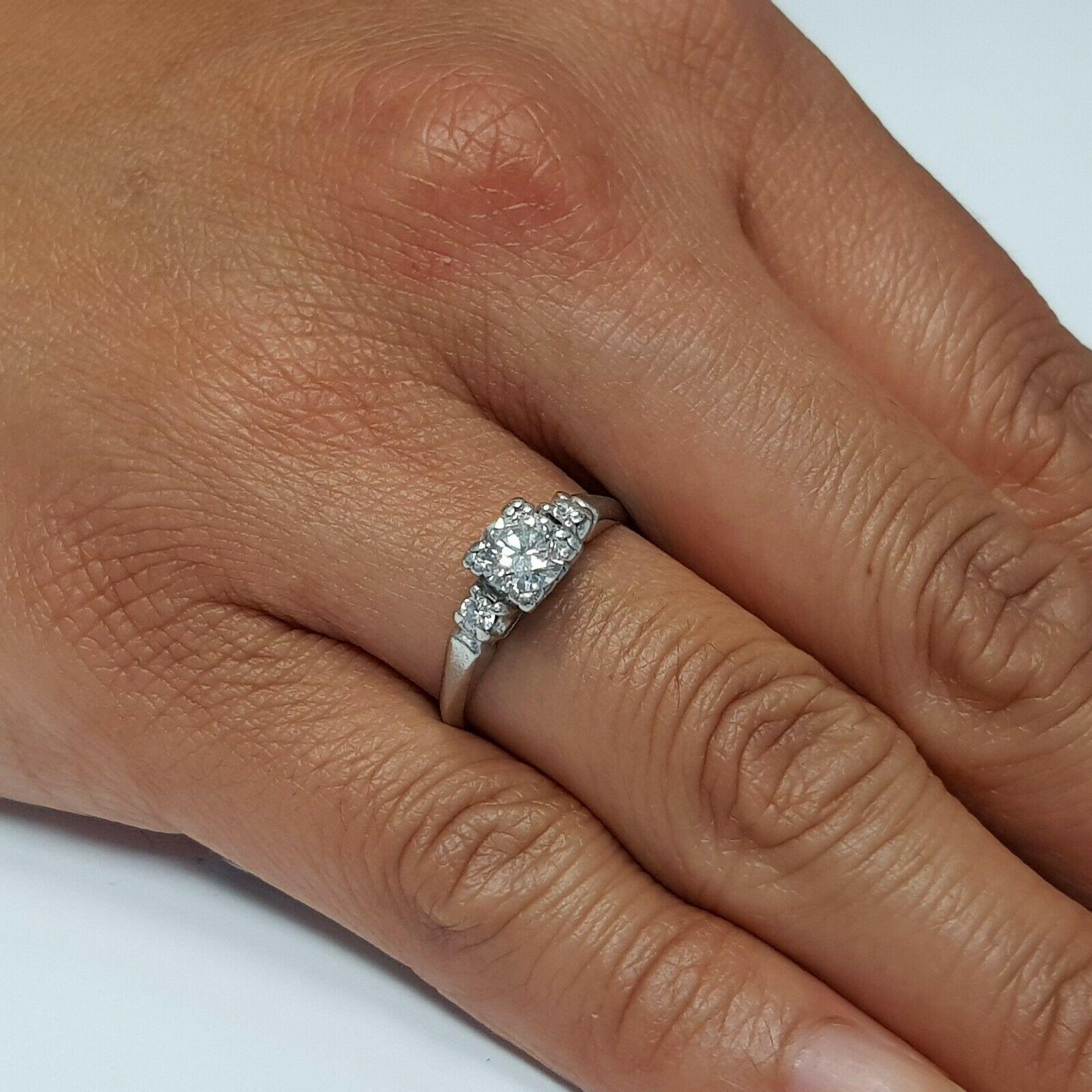  EGL Certified .48pts. Diamond 14k white gold 3 stone ring
Specifications:
    main stone: DIAMOND E/VS1 0.48 ct
    additional: DIAMONDS
    diamonds: 2 PCS
    carat total weight: 0.08
    color: E
    clarity: VS1
    metal: PLATINUM
    type: