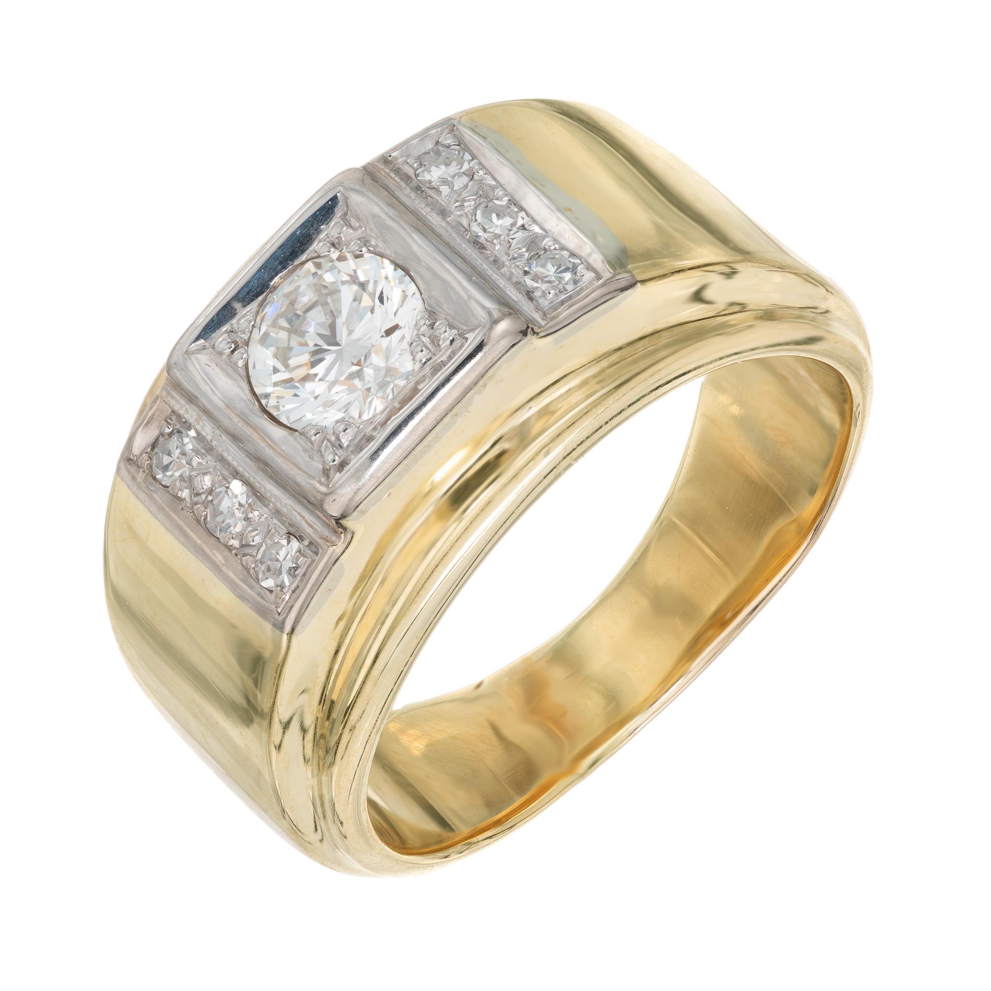 Vintage 1960's men's diamond two tone gold ring. The center is mounted with one, .50cts round brilliant Ideal cut diamond and accented with three sing cut diamonds on each side of the stone. The crown of this ring is 14k white gold with the shank