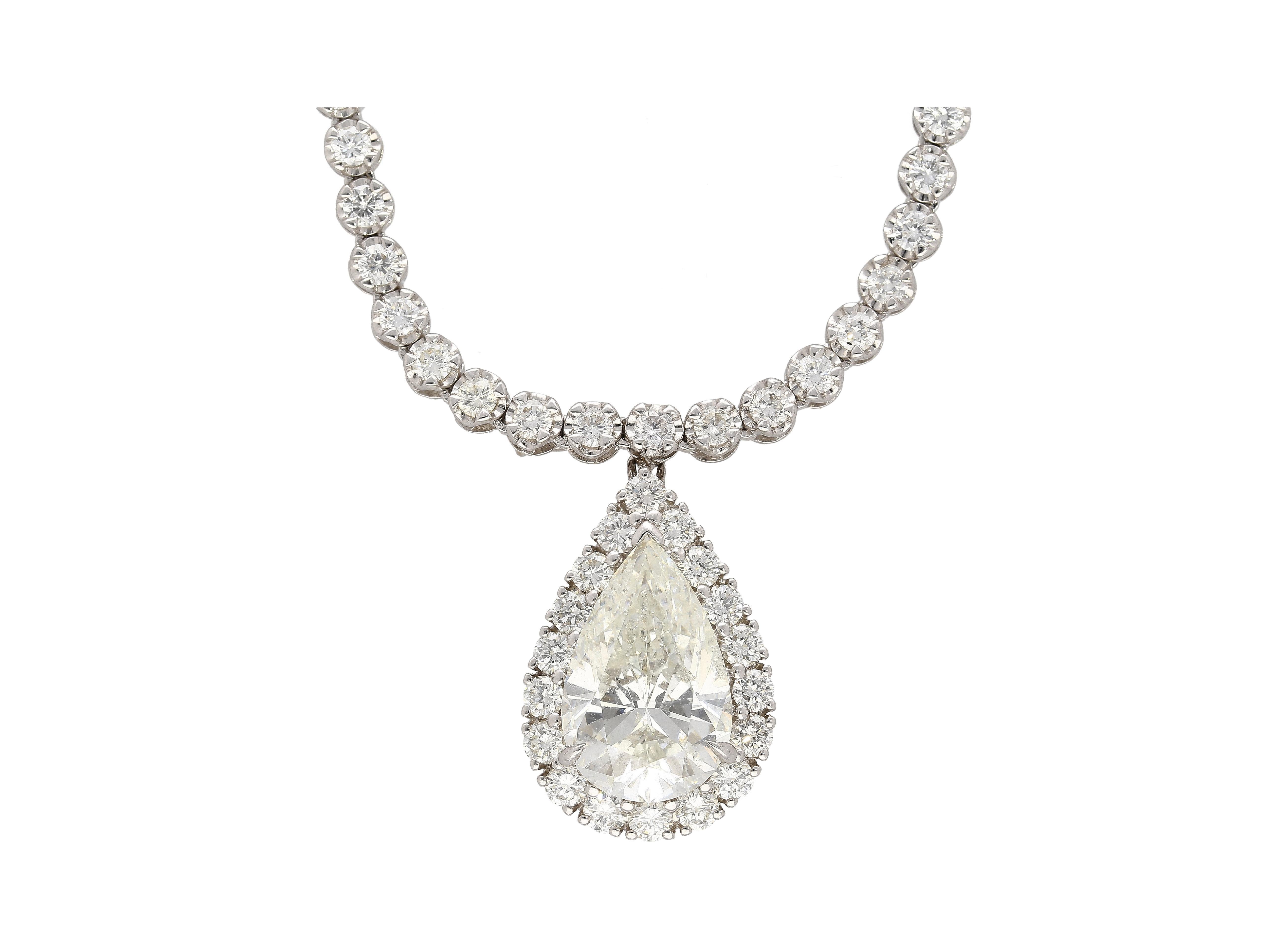 Modern EGL Certified 5.02 Carat Pear Diamond Pendant and Diamond Halo & Sapphire Detail For Sale