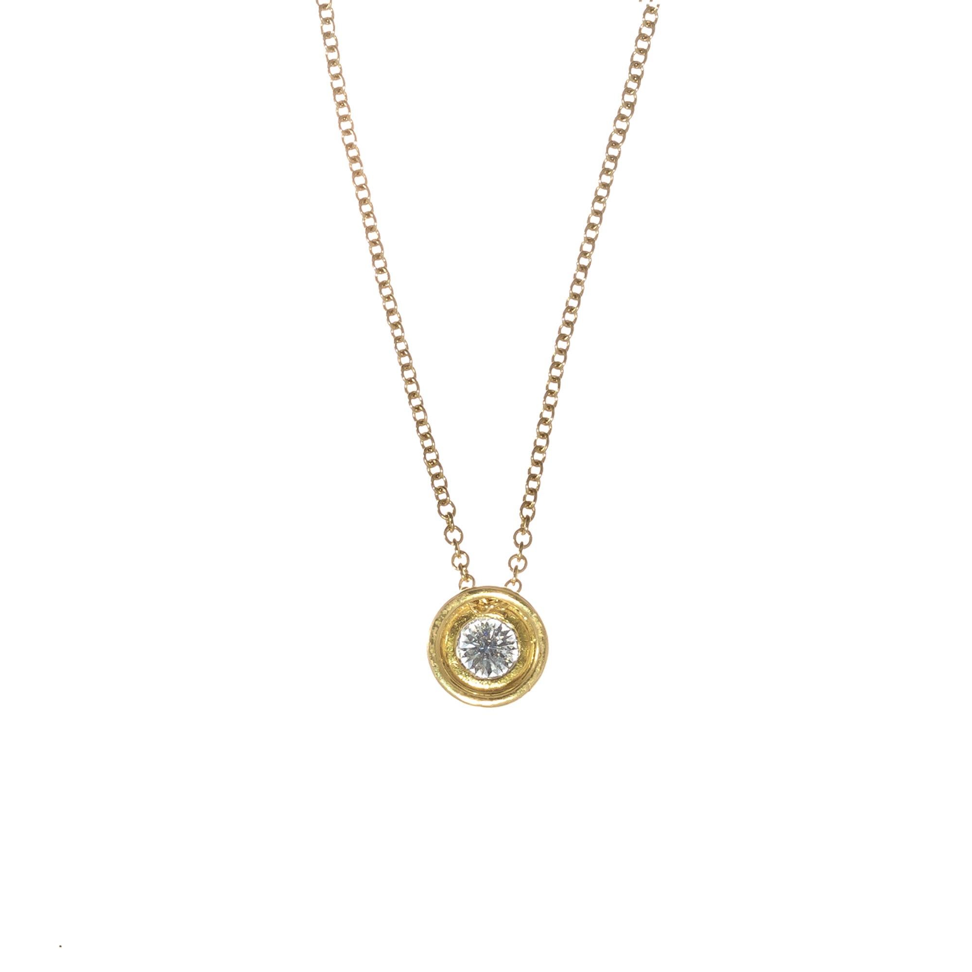 EGL certified 0.55 carat diamond bezel set slide pendant in 18k yellow gold.

1 round brilliant cut diamond G-H SI, approx. .55ct
18k yellow gold 
Stamped: 750 18k
4.8 grams
Chain: 18 Inches
Width: 9mm
Thickness/depth: 4.9mm

