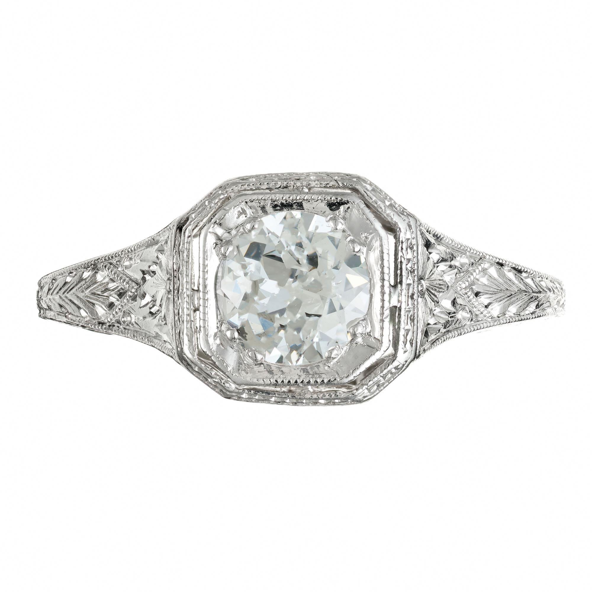 1935 Edwardian design diamond engagement ring. EGL certified round brilliant cut center diamond, in a hand pierced filigree engraved platinum setting. 

1 round brilliant cut diamond, H-I I approx. .55cts  EGL certified# 4001509546D
Size 7 and