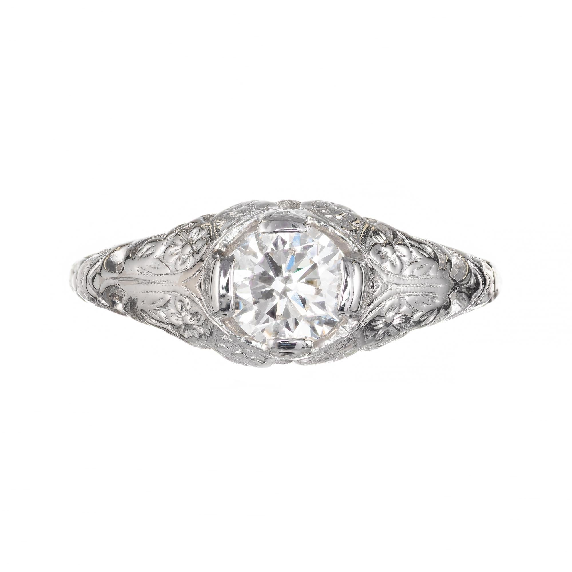 Vintage 1940s filigree diamond engagement ring set with a bright sparkly ideal cut original center diamond in platinum. EGL certified

1 round brilliant cut I-J VS diamond, Approximate .56cts EGL Certificate # 400125914D
Size 6 and sizable 
Platinum