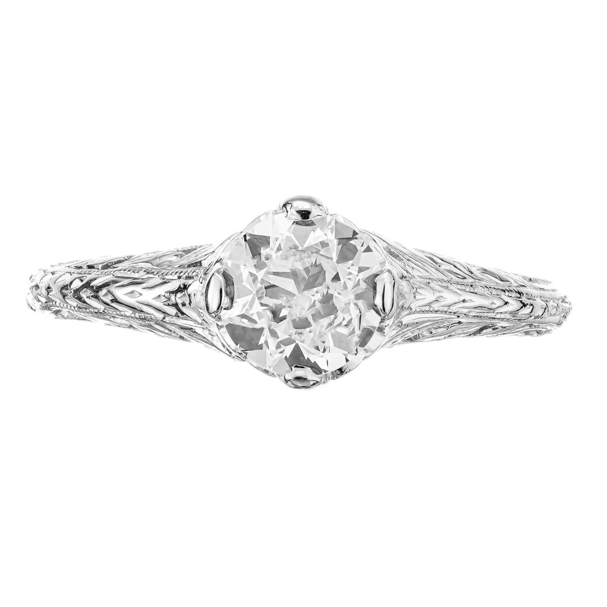 1930's diamond Art Deco engagement ring. EGL certified .63ct center diamond in a handmade platinum engraved setting. Raised crown and small table. 

1 round brilliant cut diamond, I-J VS approx. .63cts EGL Certificate # 400145988D
Size 6 and