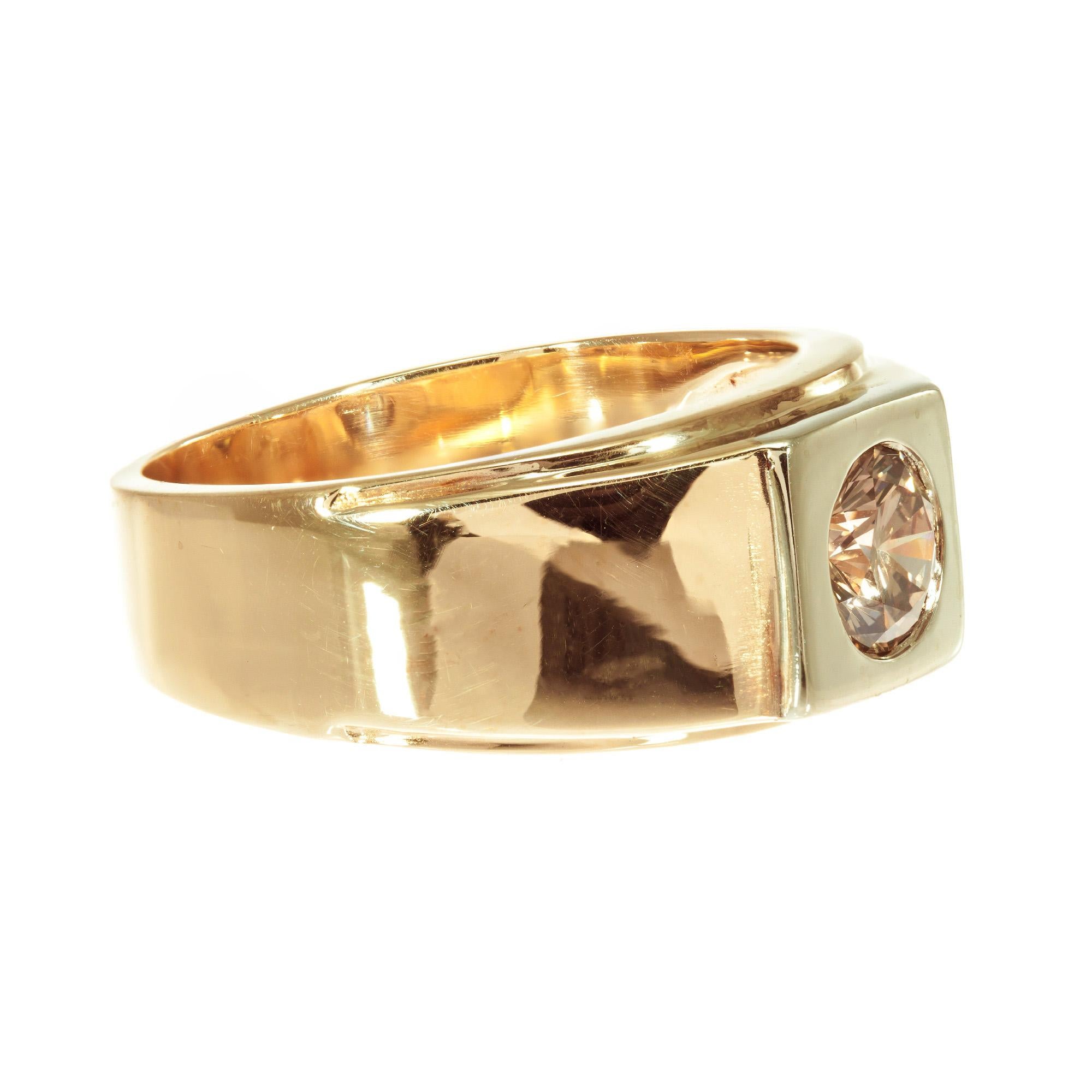 Brown diamond band ring. Simple classic yellow gold band setting with 14k white gold top. Suitable for a man or a women. 

1 round brilliant cut fancy orange brown VS2 diamond, Approximate .65ct. EGL certificate #US 400122261D
Size 8 and sizable