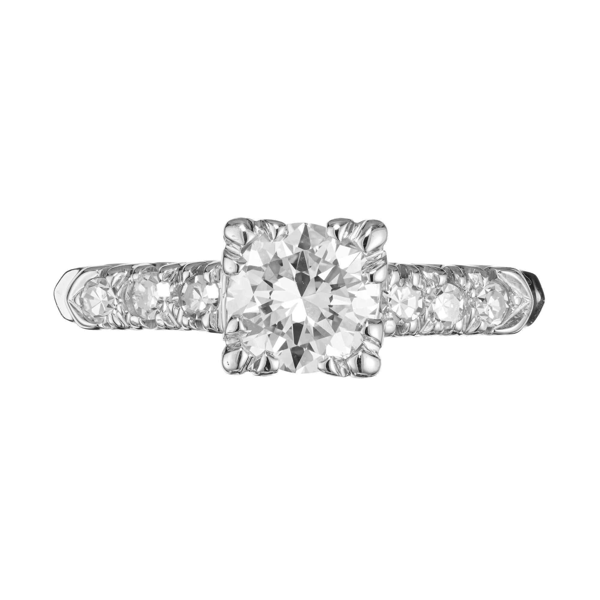 Late Art Deco 1940's diamond engagement ring. EGL certified .65ct round brilliant cut center diamond, set in a 14k white gold fishtail design setting. Both shoulders are set with 3 singe cut diamonds. EGL certified as F-G, near colorless. 

1 round