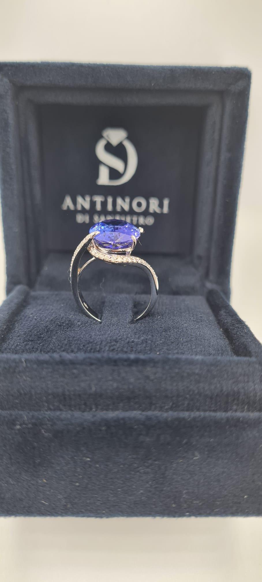 Modern EGL Certified 7 Carat Blue Violet Tanzanite 18 Carats White Gold Ring For Sale