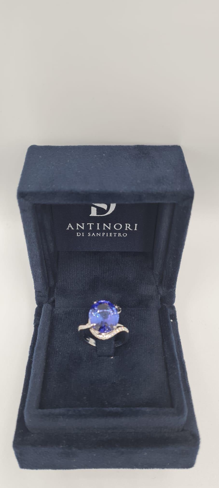 Oval Cut EGL Certified 7 Carat Blue Violet Tanzanite 18 Carats White Gold Ring For Sale