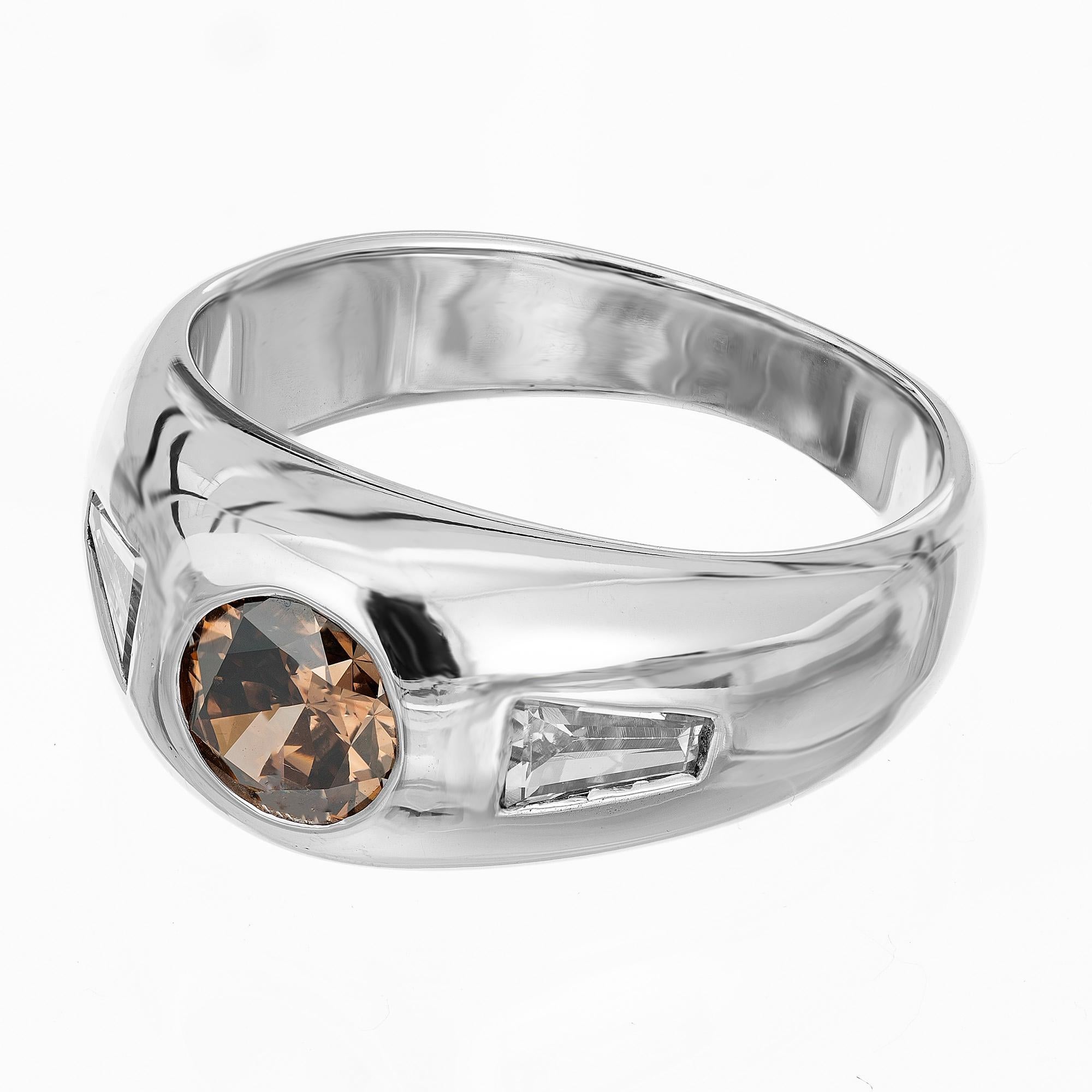 1960's Natural .85 carat round fancy dark yellowish brown diamond with a very pleasing color, fashioned into a classic men's ring with two unique light yellow diamond baguettes in a 14k white gold dome setting. The EGL certified this diamond as