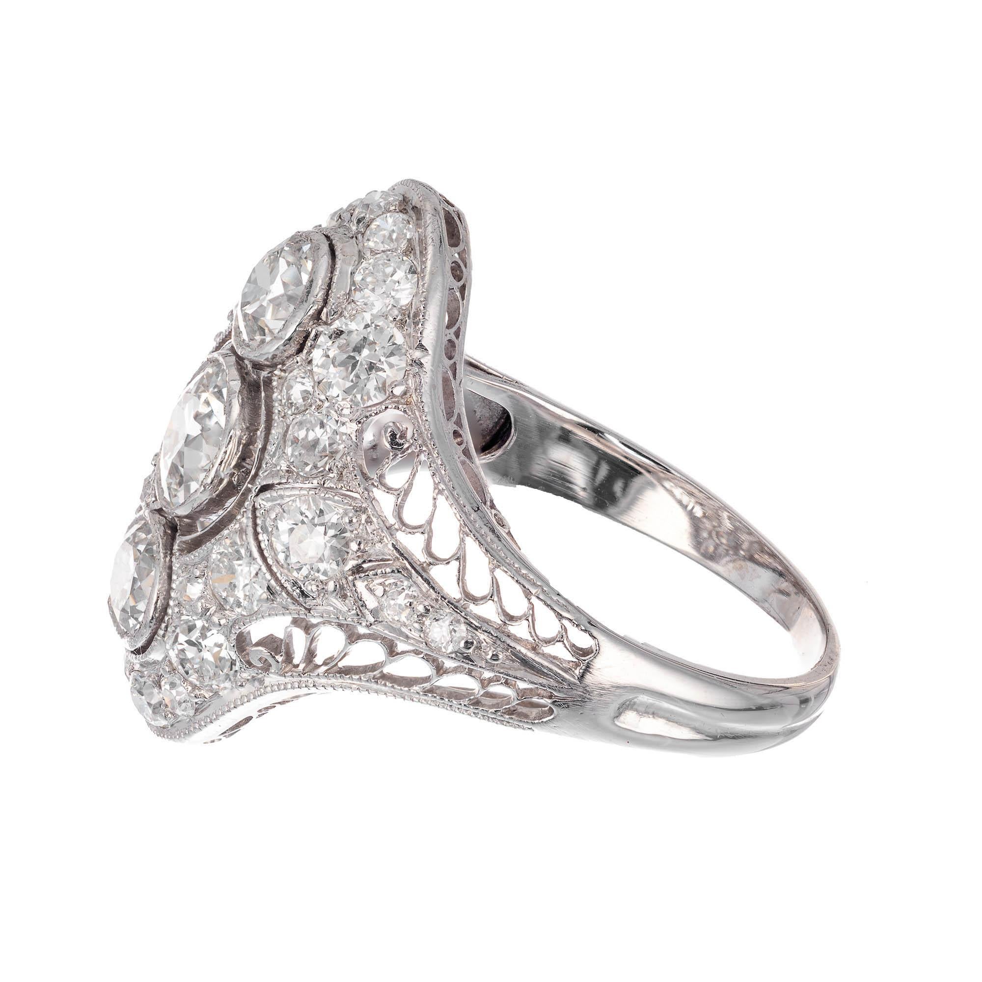 EGL Certified .86 Carat Diamond Three-Stone Edwardian Platinum Dome Ring In Good Condition For Sale In Stamford, CT