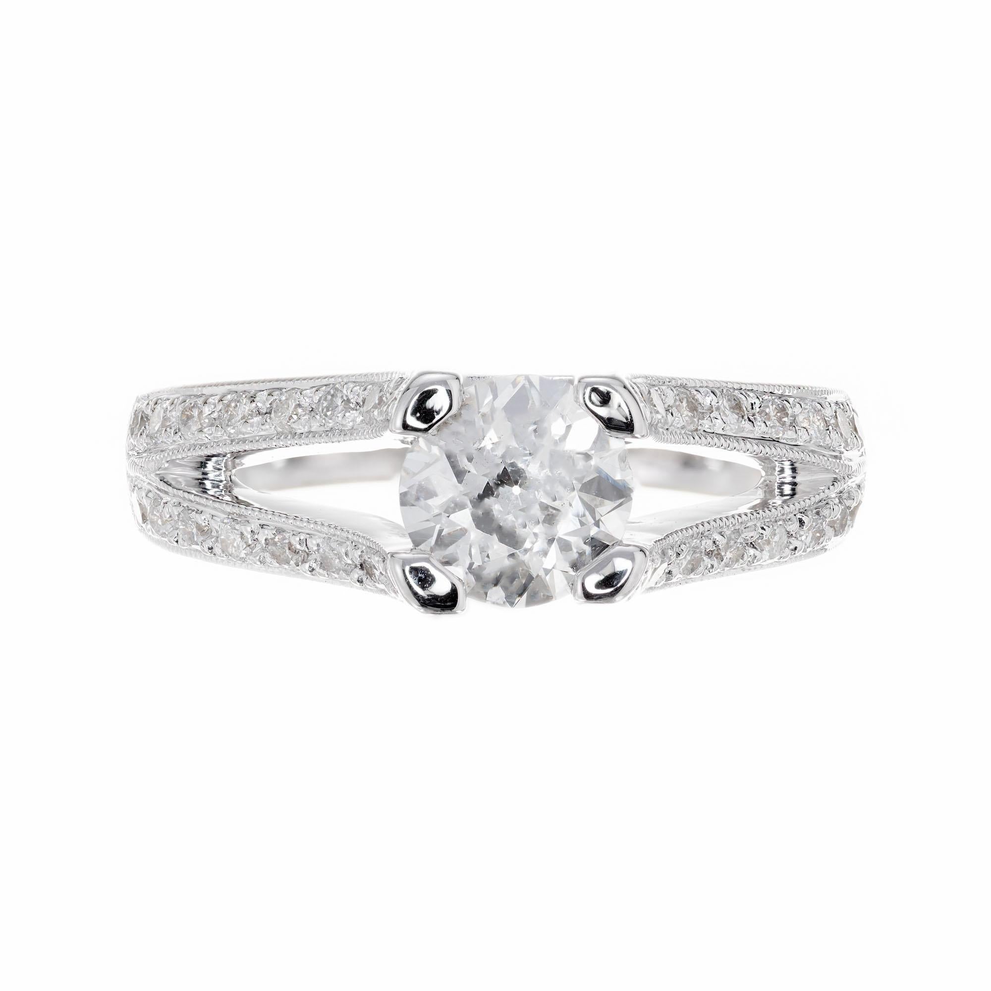 Diamond engagement ring. EGL certified transitional cut center stone with 32 round cut accent diamonds along the split shank 18k white gold setting. The diamond circa 1930-1940, the setting was recently created for this stone. 

1 transitional cut