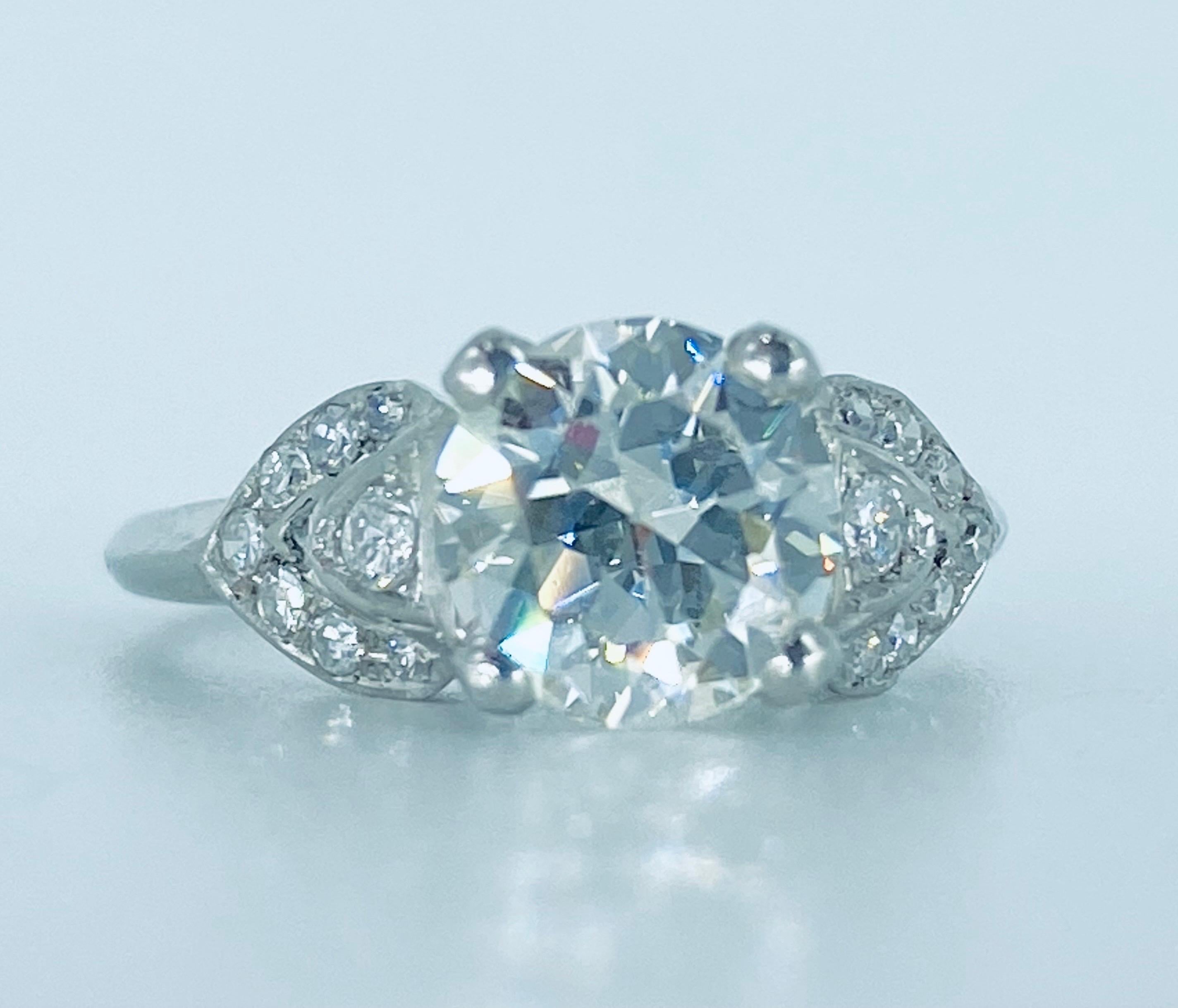 Art Deco EGL Certified Center 1.31 Carat Diamond Platinum Engagement Ring For Sale