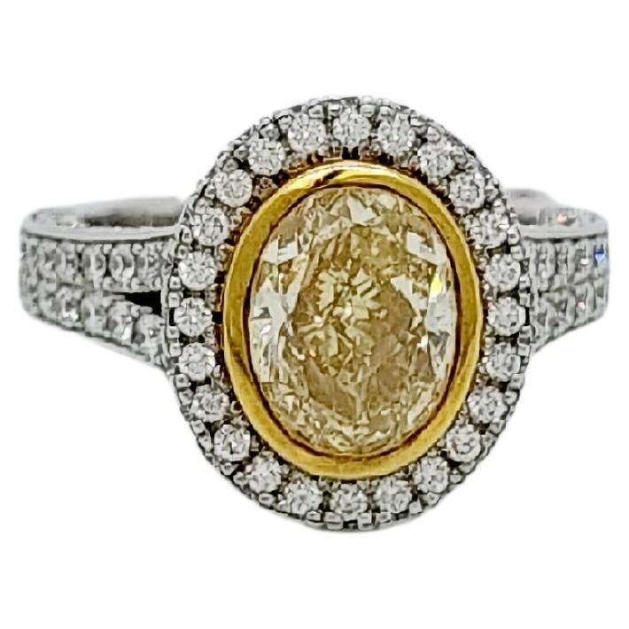 EGL Certified Fancy Yellow Diamond Oval Ring in 18k Two Tone Gold For Sale