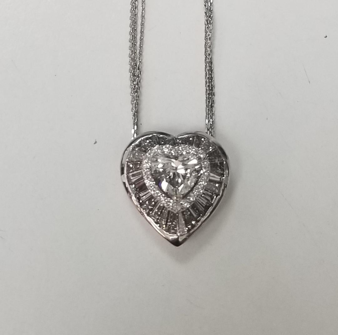 *Motivated to Sell – Please make a Fair Offer*
Beautiful and elegant, this heart shape diamond with channel set halo baguette and round diamonds
Specifications:
    main diamond: EGL Certified Heart shape Diamond G SI3 1.40 cts.
    diamond: 26