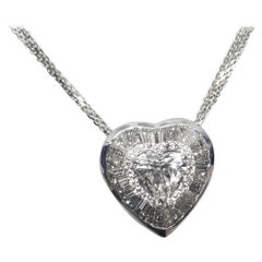 Diamante a forma di cuore certificato EGL G SI3 1,40 carati con baguette e castone rotondo