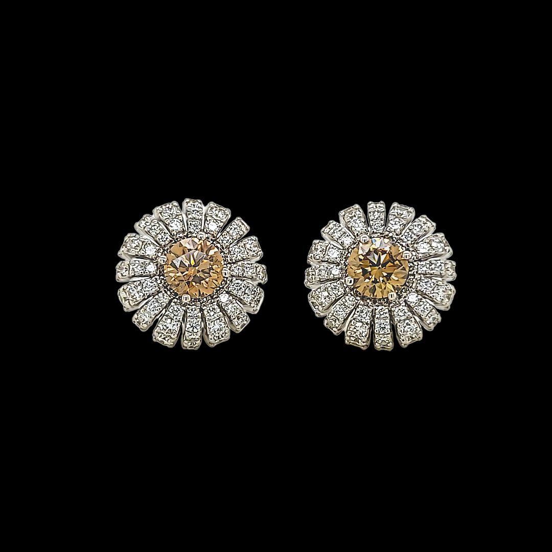 One of a kind interchangeable pair of diamond earrings 11.43 Carat total diamond weight. 
Breath taking handcrafted earrings made with exquisite craftsmanship  and set with high quality 144 round brilliant cut diamonds surrounds.
The earring set