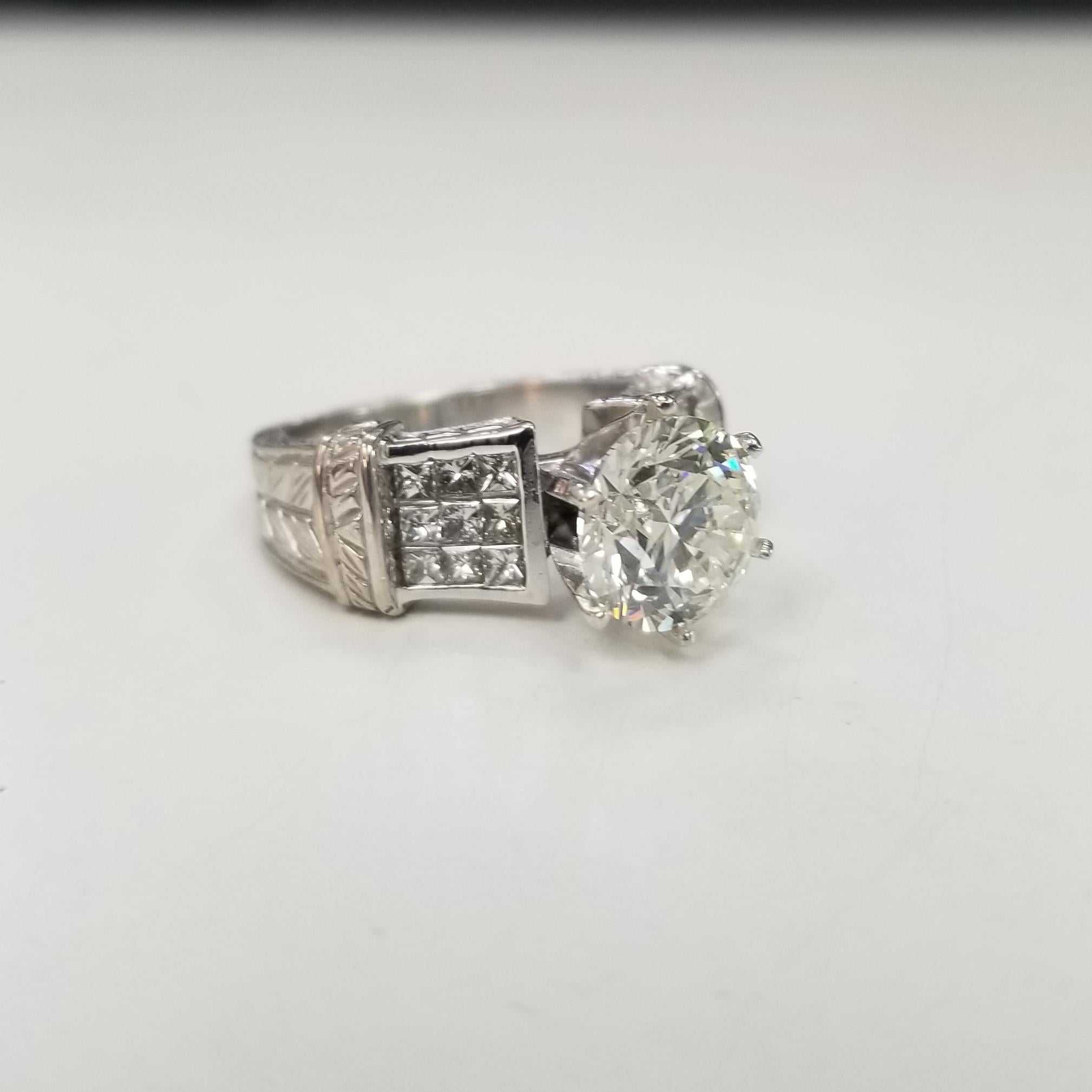 This is a 18k white gold ring with invisible set princess diamonds . The diamonds are tightly set close together to form a diamond invisible set. It weighs 11 grams set in 18k white gold. The ring size is currently 6.5 US, but can be resized for
