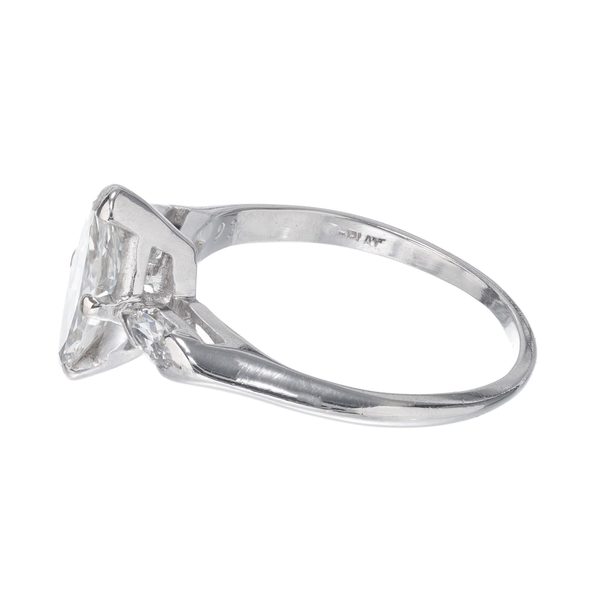 marquise side stone engagement ring