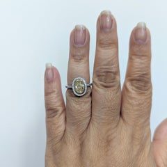 EGL Fancy Yellow Oval and White Diamond Ring in 18K 2 Tone Gold
