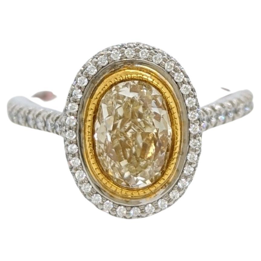EGL Fancy Yellow Oval and White Diamond Ring in 18K 2 Tone Gold For Sale