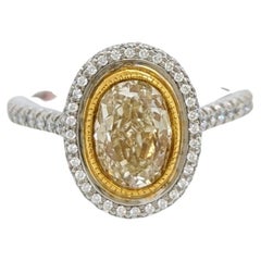 EGL Fancy Yellow Oval and White Diamond Ring in 18K 2 Tone Gold